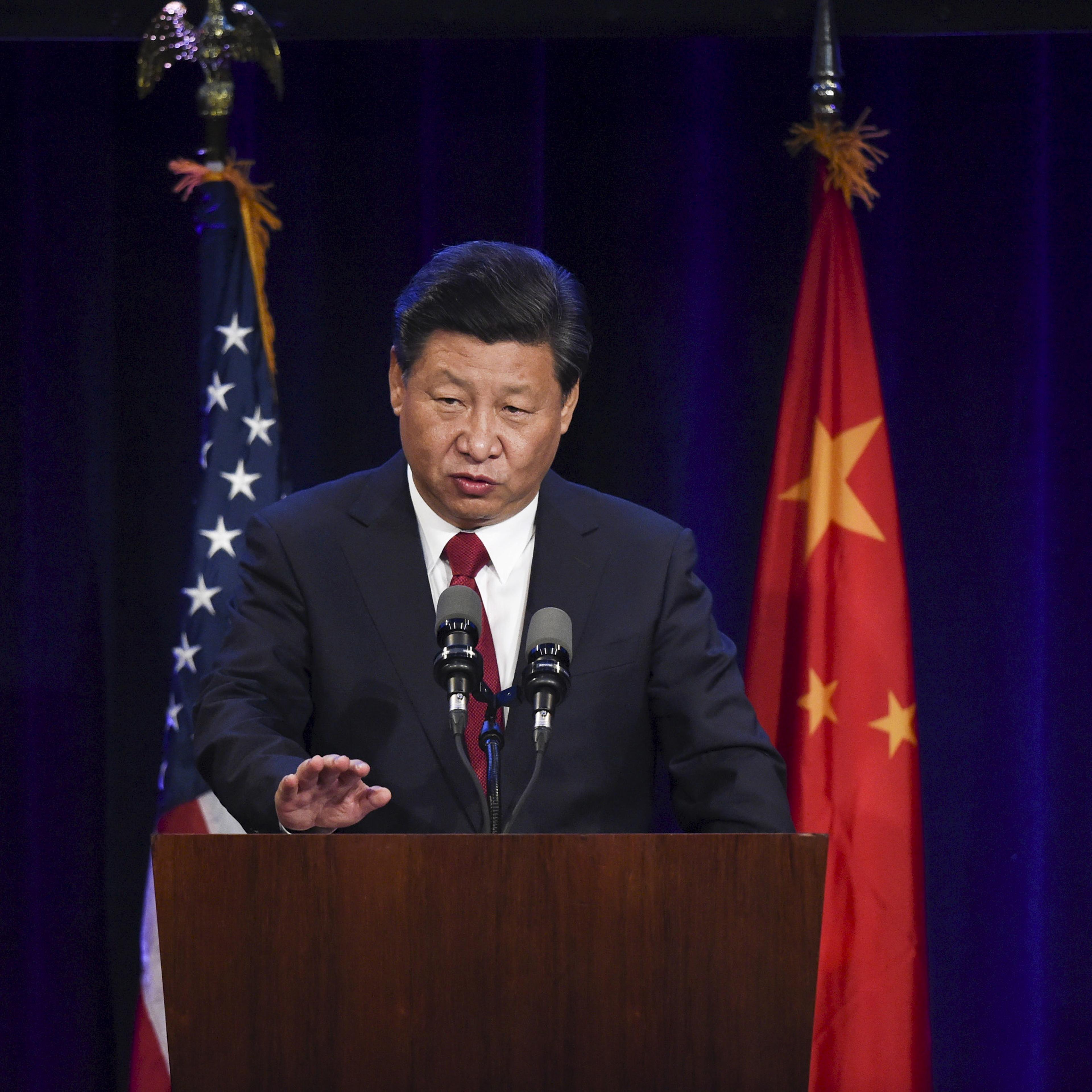 Chinese President Xi Jinping delivers a policy speech to Chinese and United States CEOs during a dinner reception in Seattle, Washington