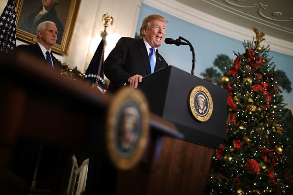 U.S. President Donald Trump announces that the U.S. government will formally recognize Jerusalem as the capital of Israel with Vice President Mike Pence (L) in the Diplomatic Reception Room at the White House December 6, 2017 in Washington, DC.