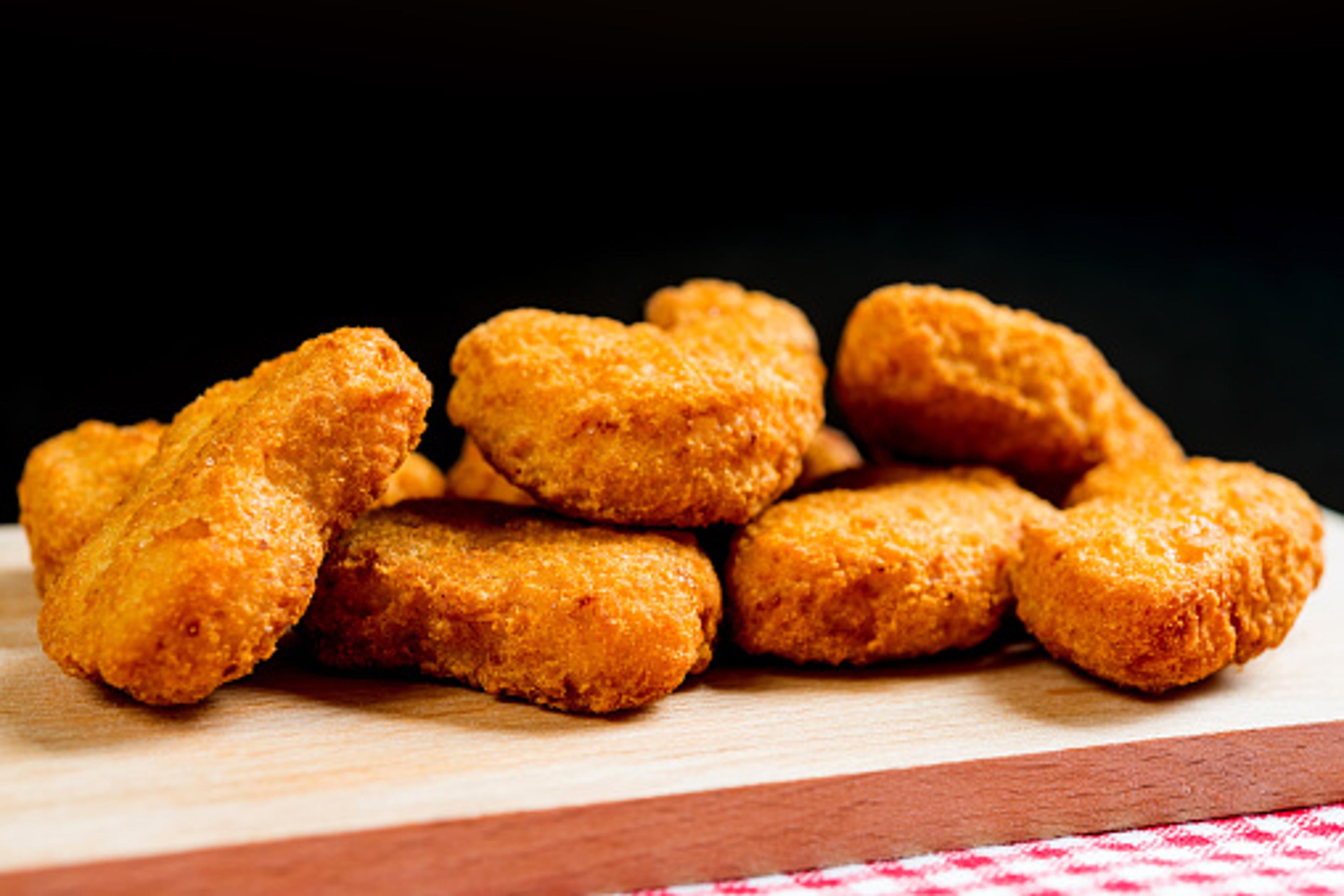 Close-up of chicken nuggets on cutting board