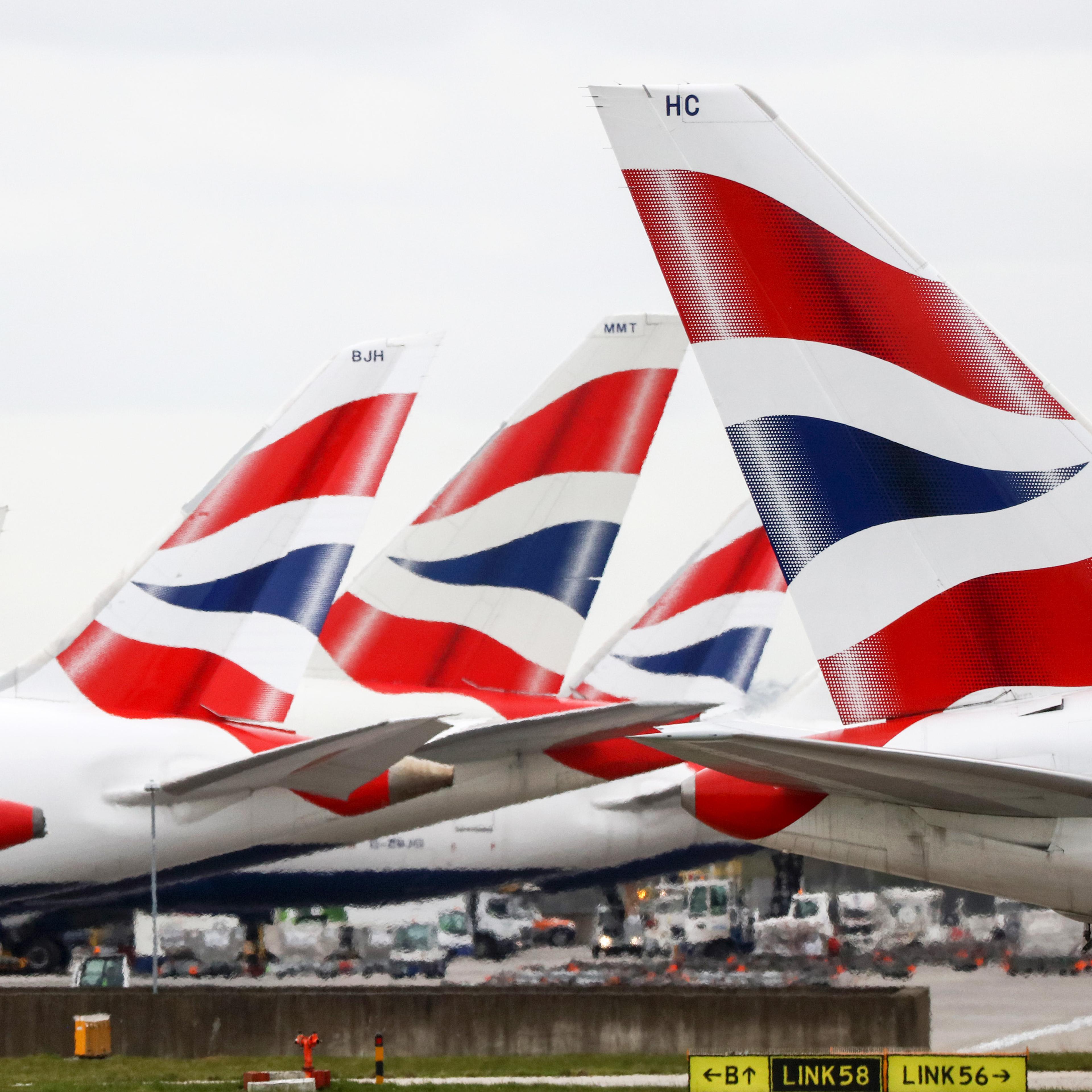 Flights Operated By British Airways Carry Passengers At Heathrow Airport