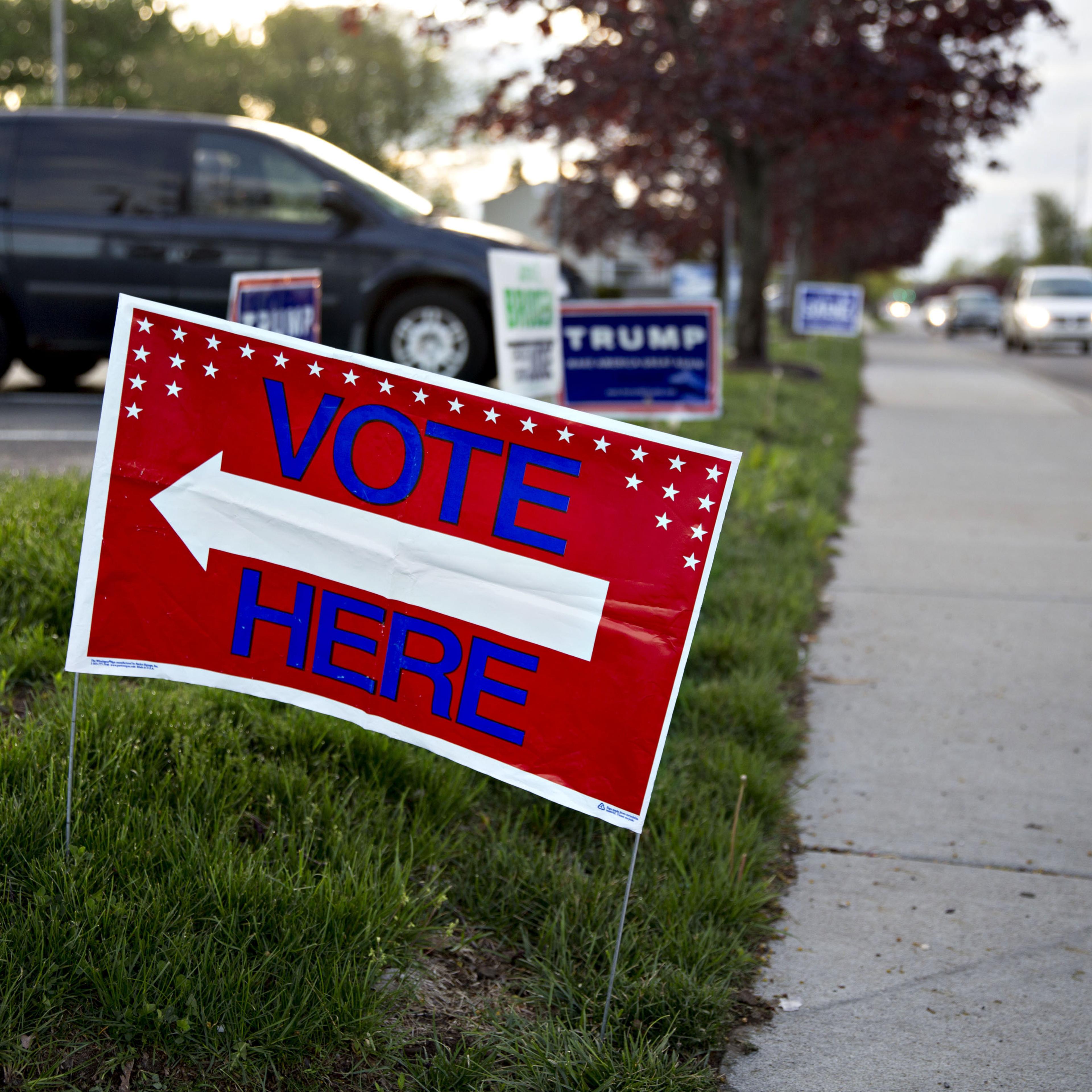 A "Vote Here" sign stands outside a polling station during the presidential primary vote in South Bend, Indiana, U.S., on Tuesday, May 3, 2016.