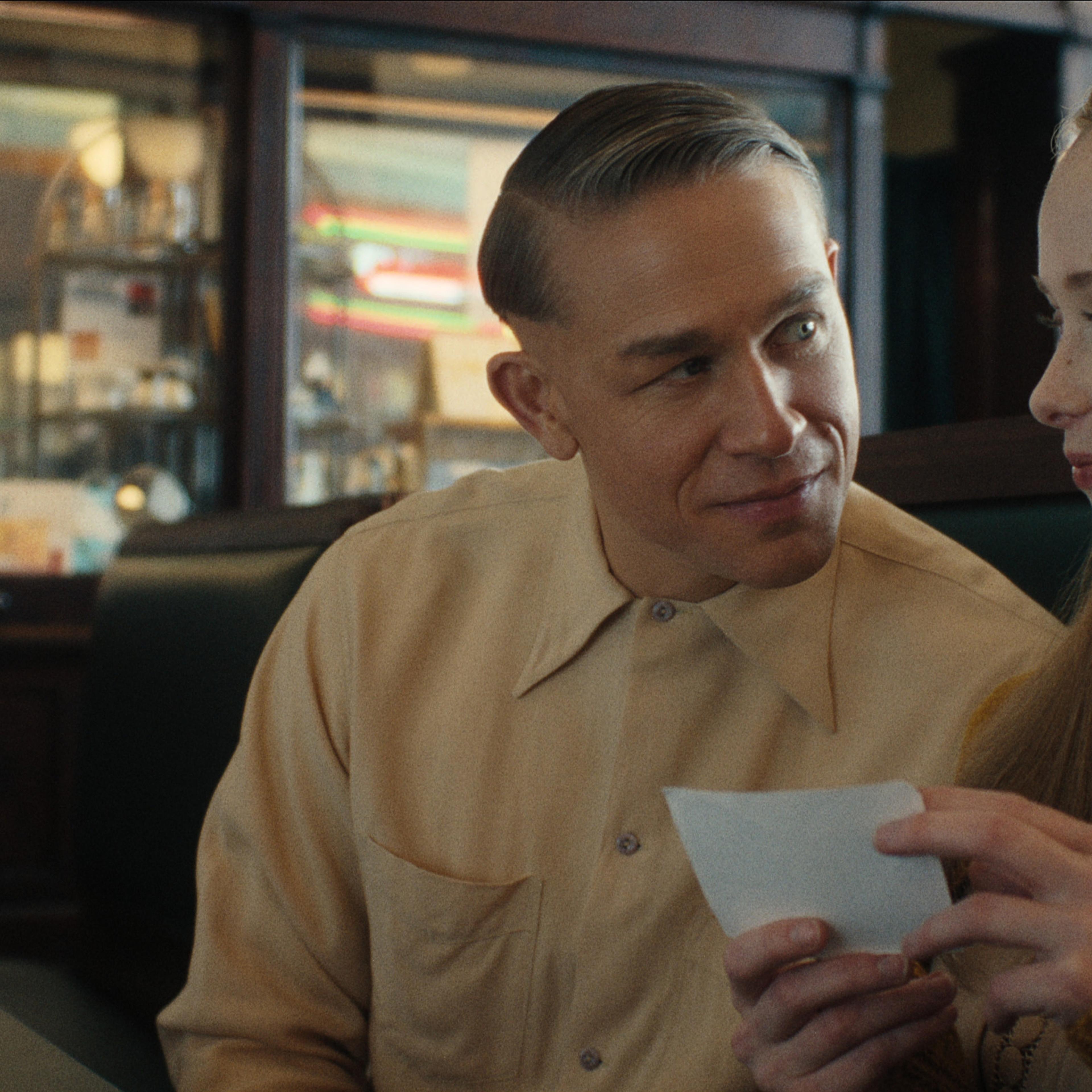 Monster: The Ed Gein Story. (L to R) Charlie Hunnam as Ed Gein, Suzanna Son as Adelina in episode 302 of Monster: The Ed Gein Story. Cr. Courtesy Of Netflix © 2025
