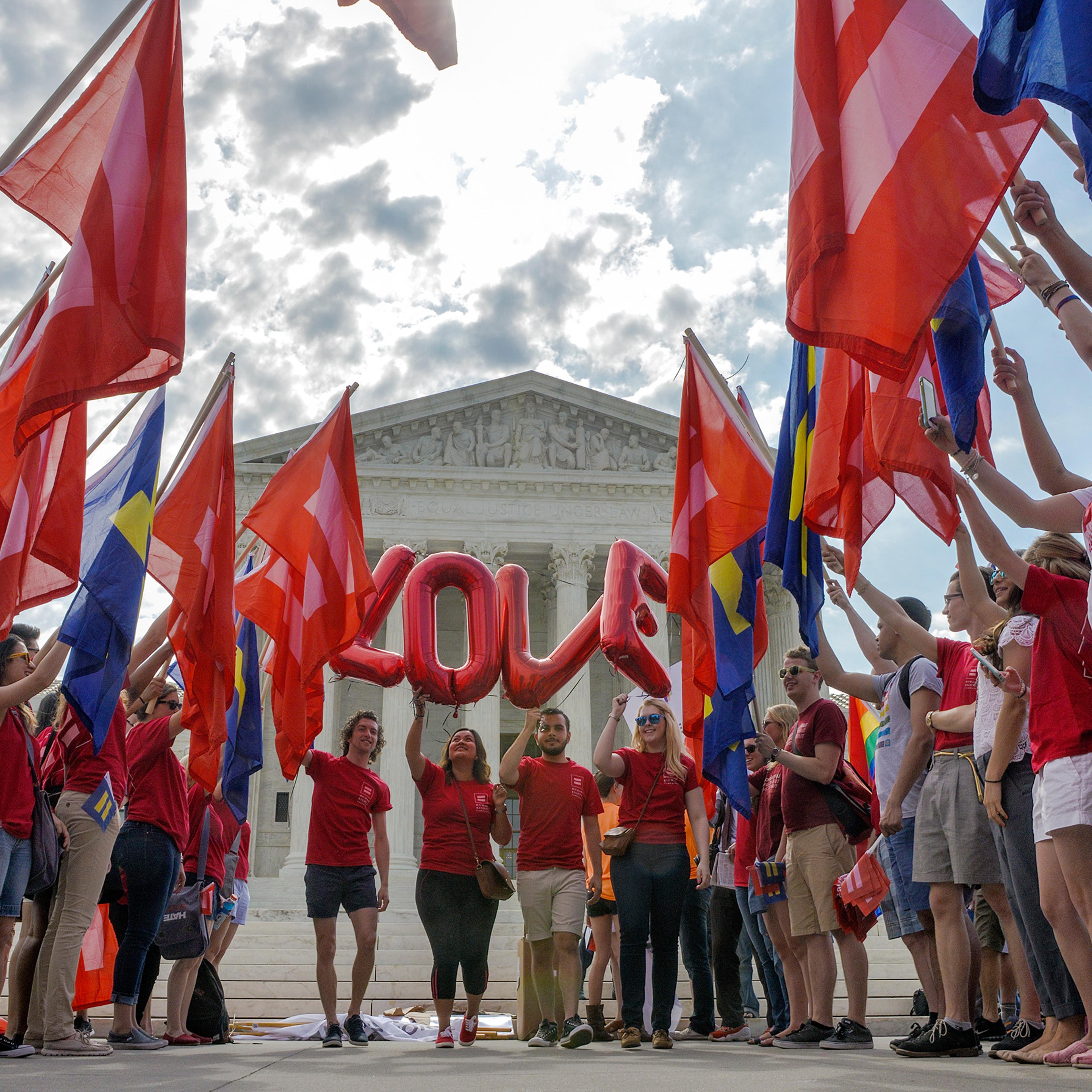Supporters of same sex marriage rally in front of the Supreme Court awaiting a ruling to legalize gay marriage nationwide in Washington on June, 25, 2015.