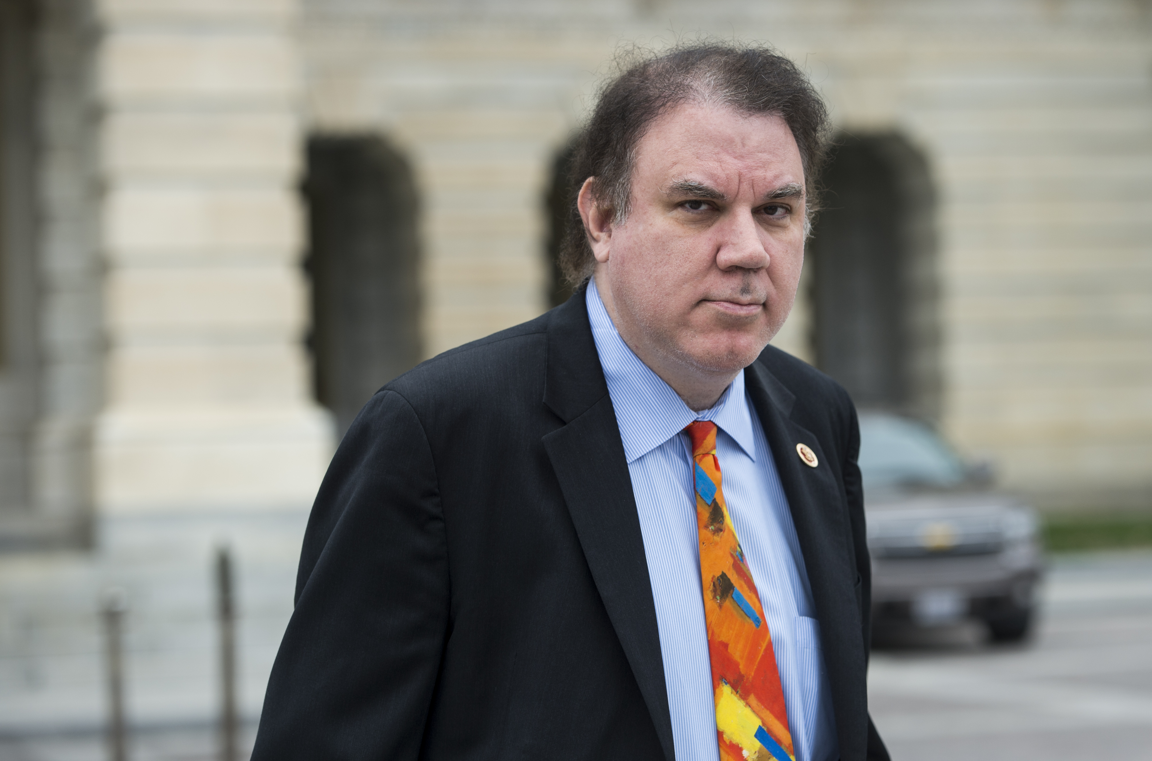 Rep. Alan Grayson, D-Fla., leaves the Capitol following the last vote of the week on Friday, April 4, 2014.