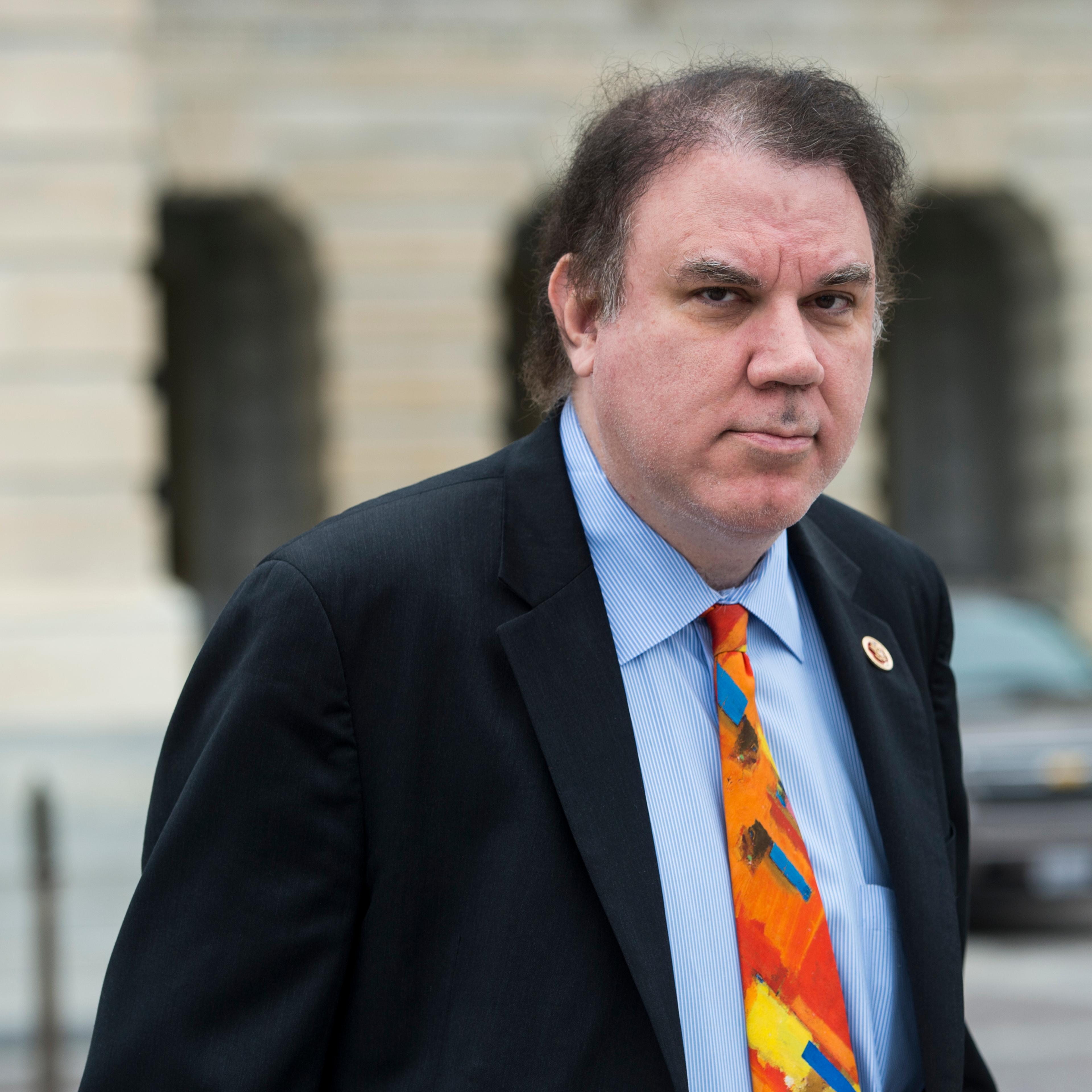 Rep. Alan Grayson, D-Fla., leaves the Capitol following the last vote of the week on Friday, April 4, 2014.