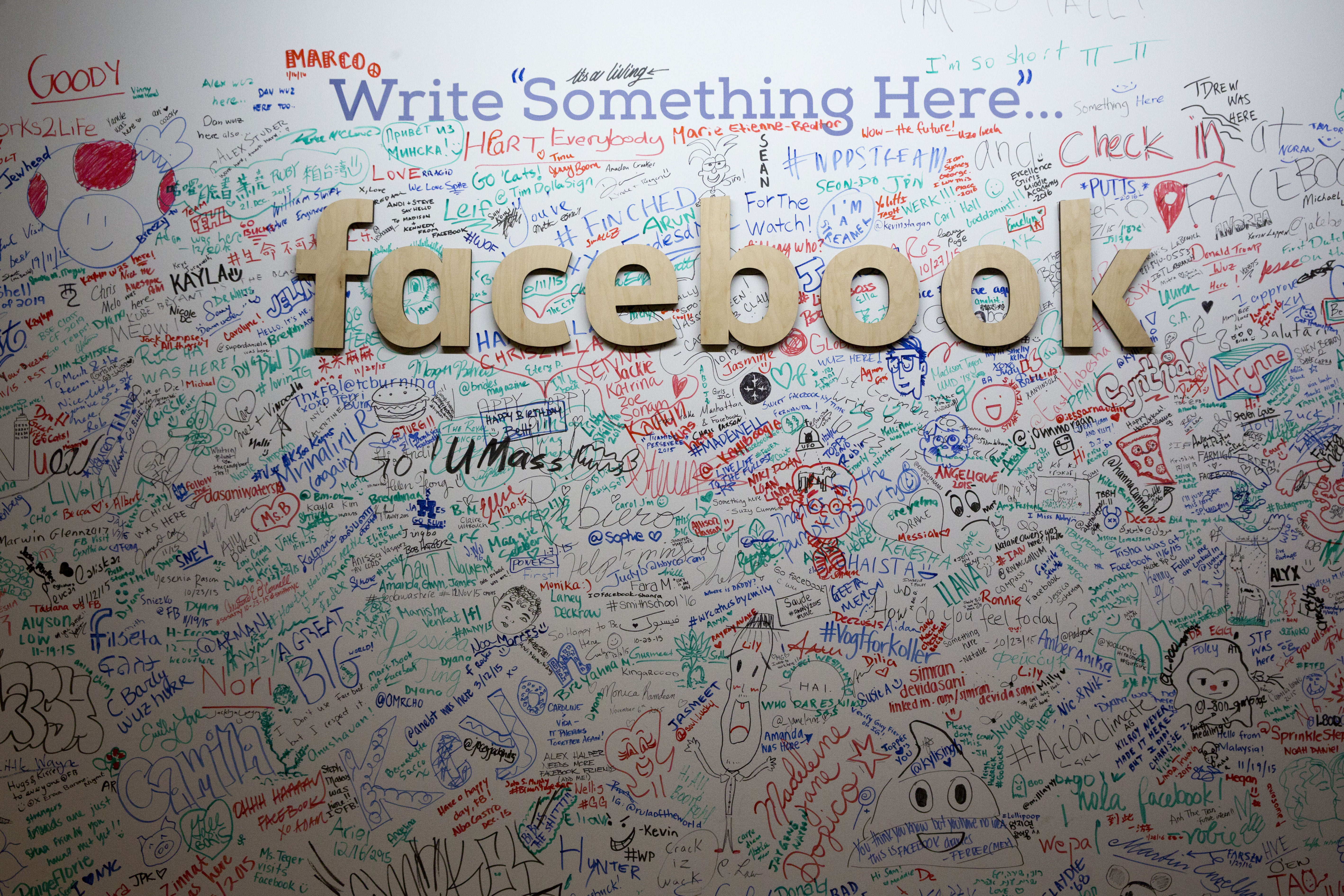 The Facebook signature wall at the company's office in New York on Feb. 18, 2016.
