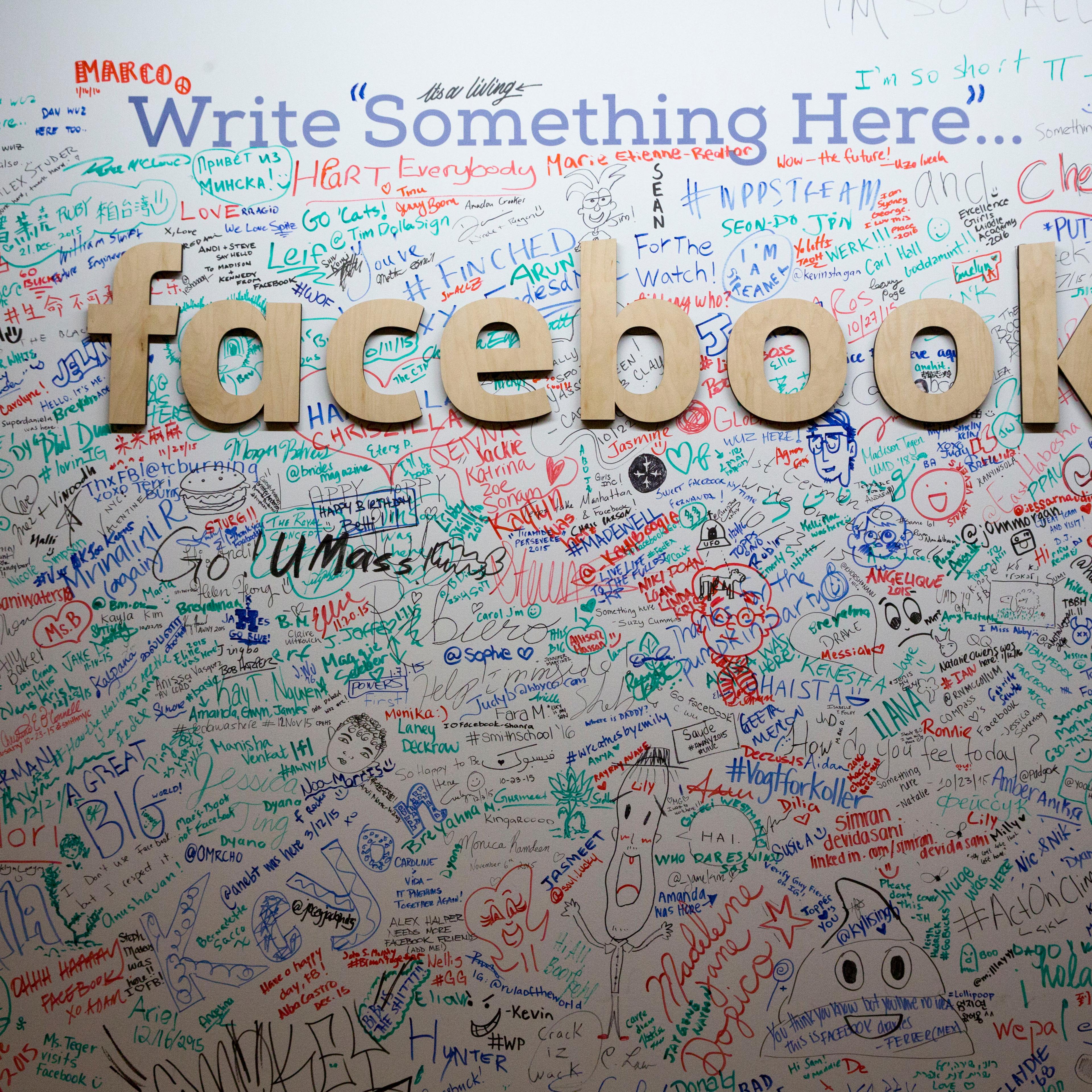 The Facebook signature wall at the company's office in New York on Feb. 18, 2016.