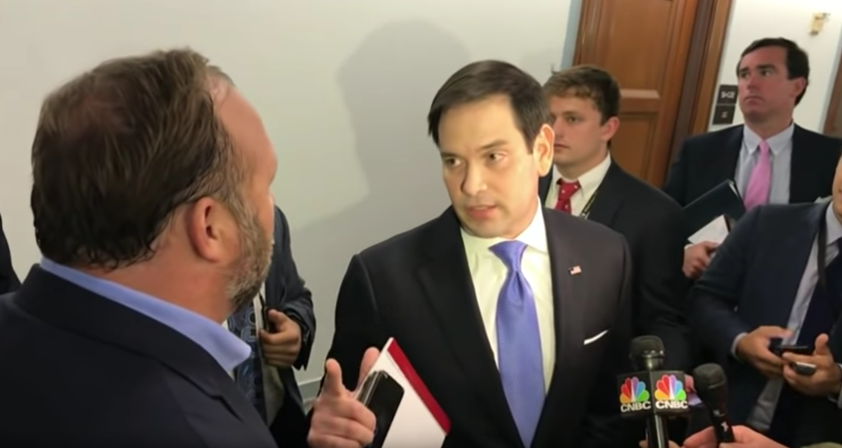This screenshot from an Associated Press YouTube video shows Sen. Marco Rubio and Alex Jones clashing outside the Senate hearing on social media regulation on Wednesday. 