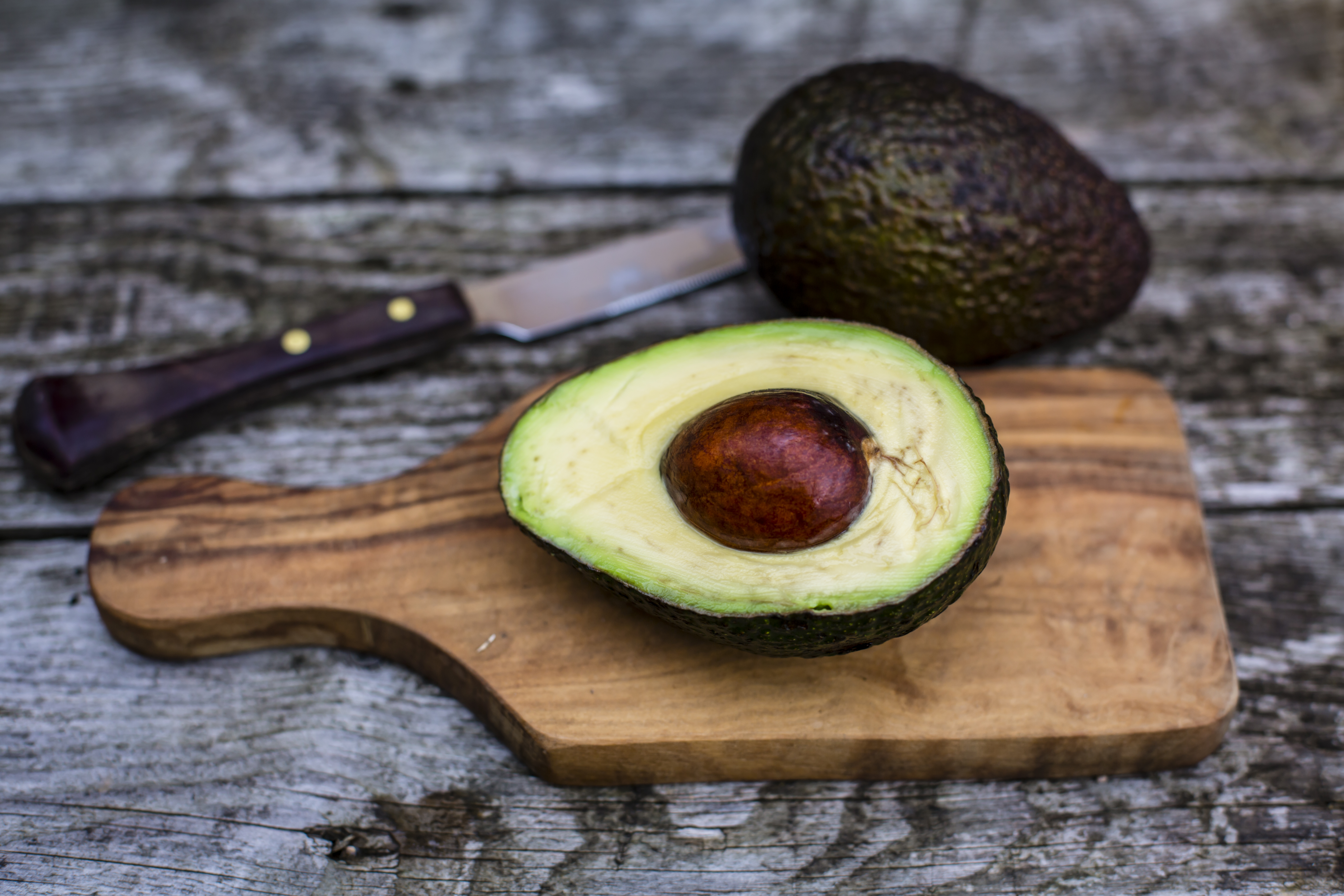 Chopped avocado on chopping board
