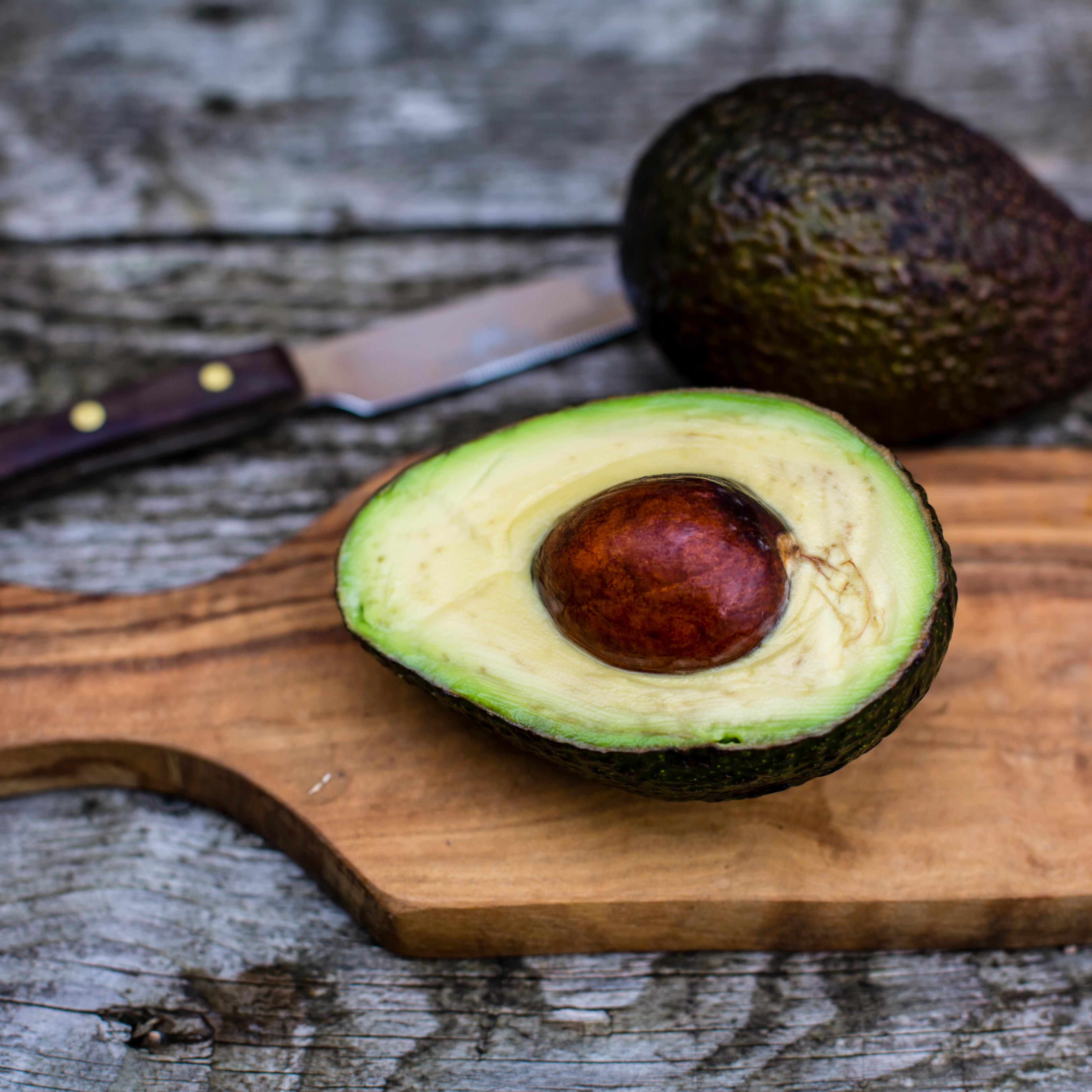 Chopped avocado on chopping board
