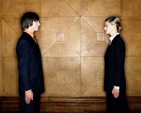 business-man-woman-facing-each-other