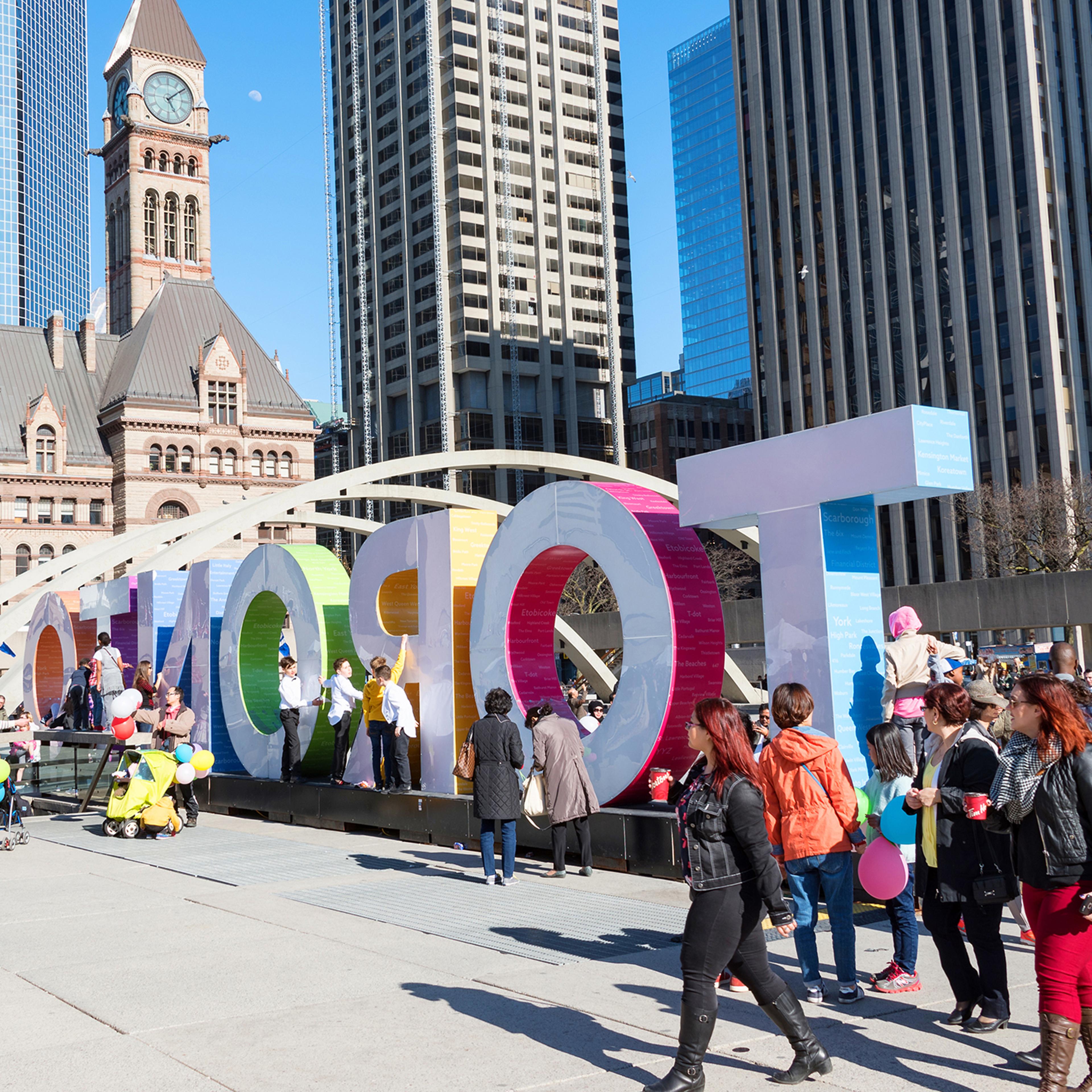 Nathan Philips Square: People sitting near Toronto