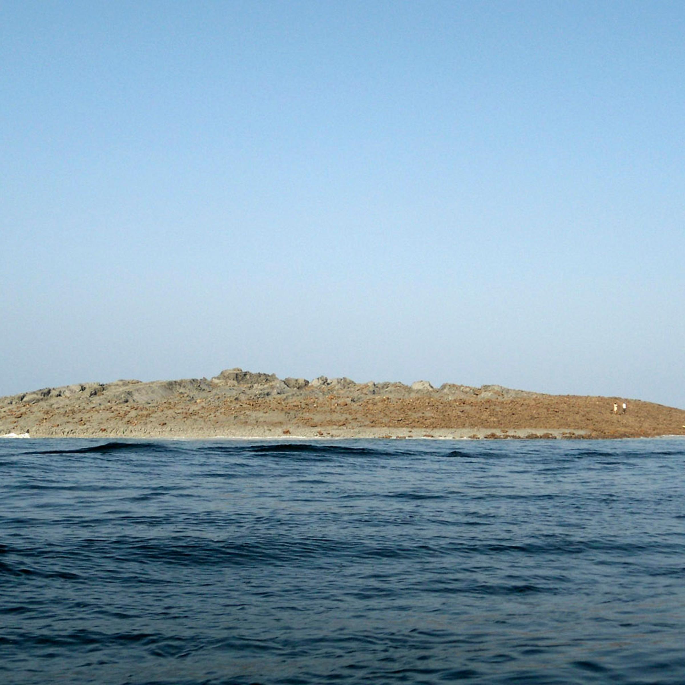 An island that rose from the sea following an earthquake is pictured off Pakistan's Gwadar coastline in the Arabian Sea