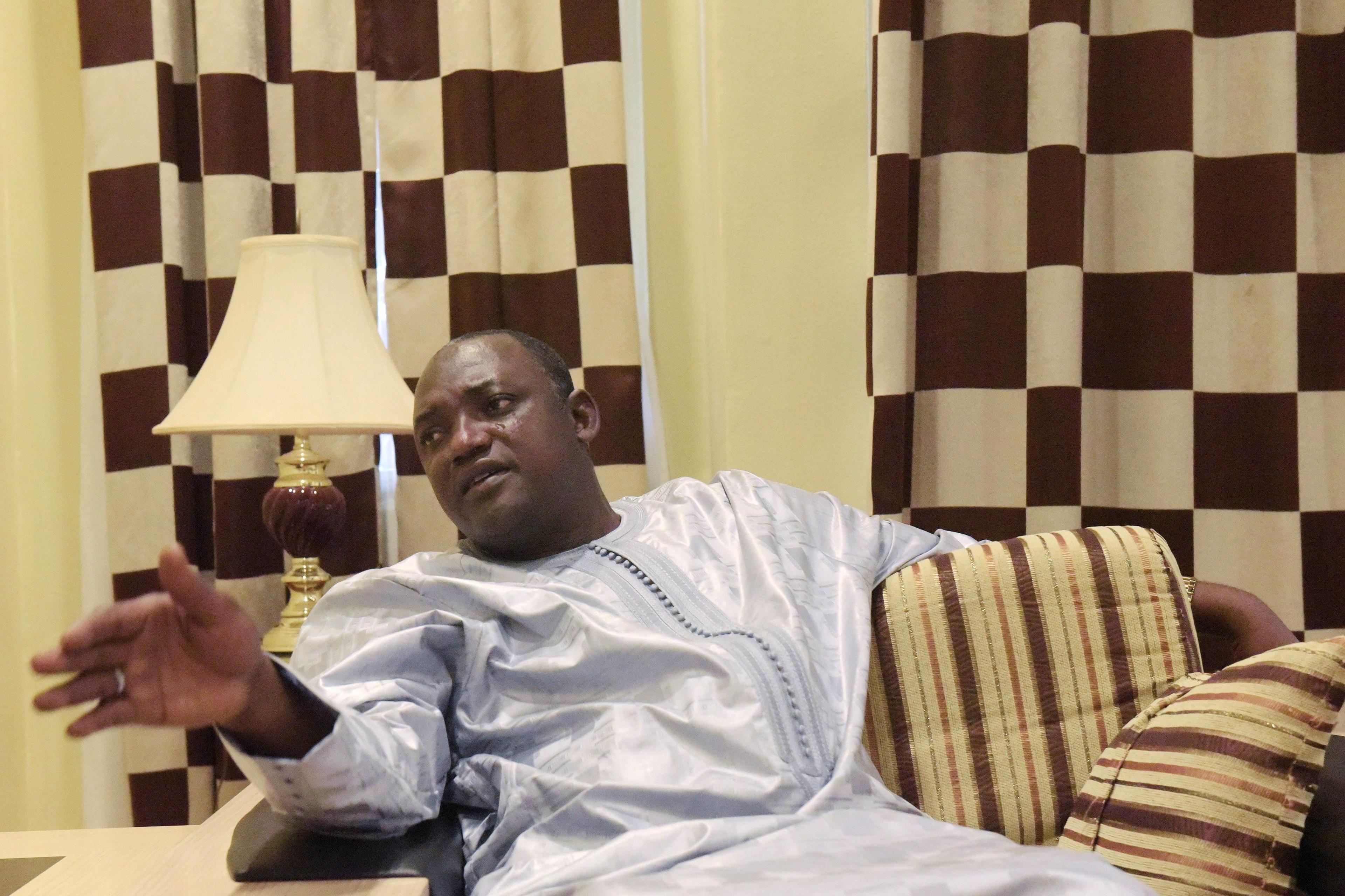 Gambian president-elect Adama Barrow speaks during an interview in Banjul on December 12, 2016.