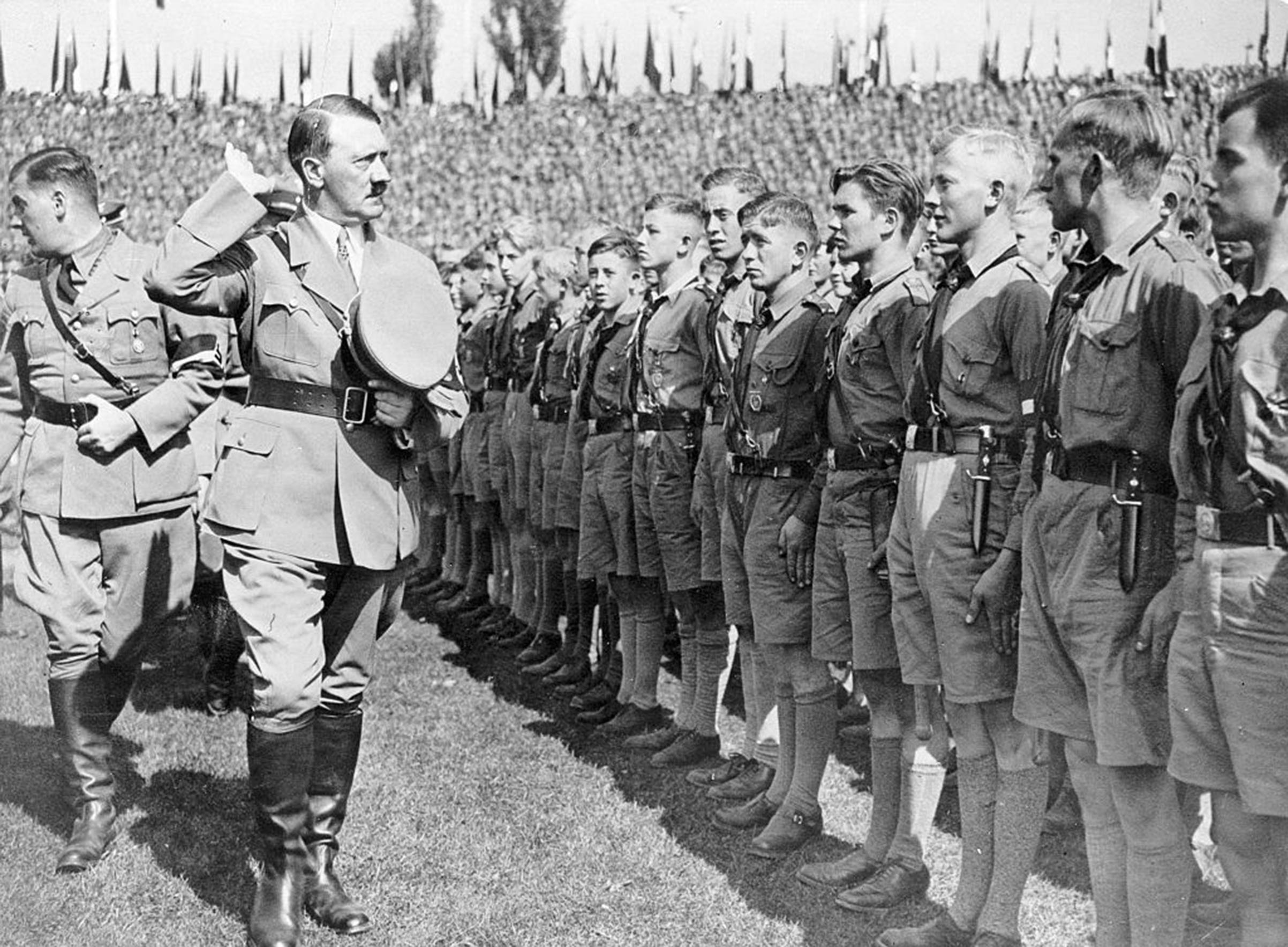 Adolf Hitler and Nazi Youth leader Baldur von Schirach arriving at a stadium in Nuremberg for a Hitler Youth rally on Sep. 8, 1934. 