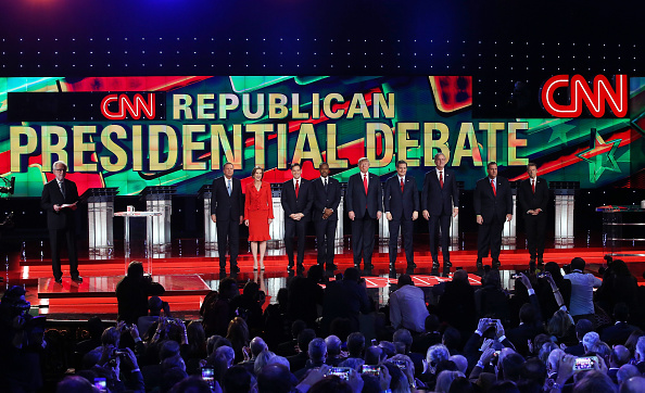 CNN anchor Wolf Blitzer looks on as Republican presidential candidates Ohio Gov. John Kasich, Carly Fiorina, Sen. Marco Rubio (R-FL), Ben Carson, Donald Trump, Sen. Ted Cruz (R-TX), Jeb Bush, New Jersey Gov. Chris Christie and Sen. Rand Paul (R-KY) are i
