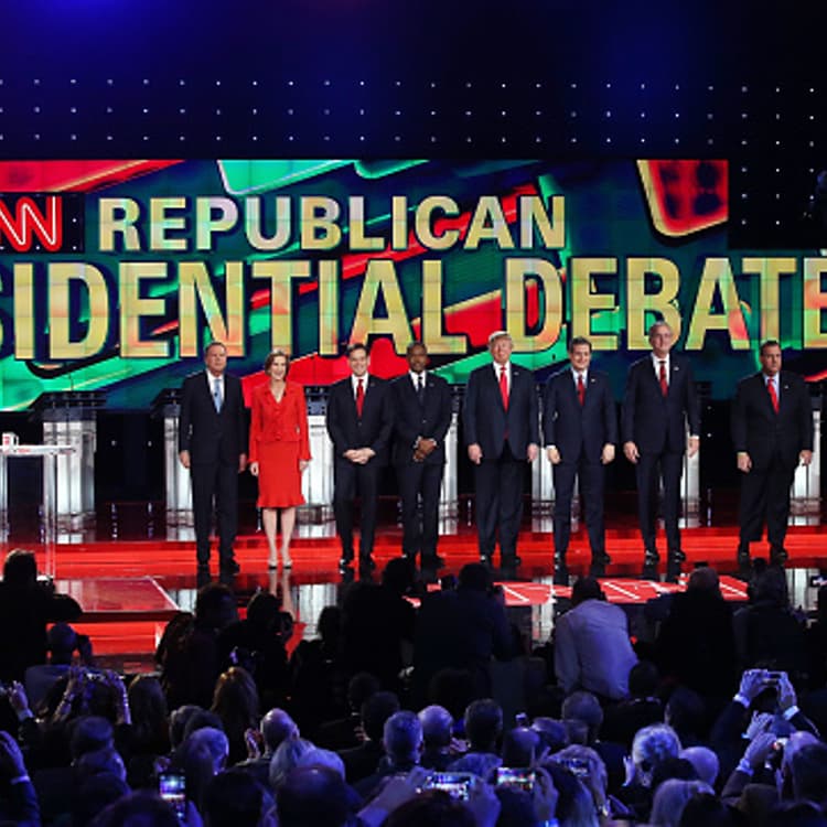 CNN anchor Wolf Blitzer looks on as Republican presidential candidates Ohio Gov. John Kasich, Carly Fiorina, Sen. Marco Rubio (R-FL), Ben Carson, Donald Trump, Sen. Ted Cruz (R-TX), Jeb Bush, New Jersey Gov. Chris Christie and Sen. Rand Paul (R-KY) are i