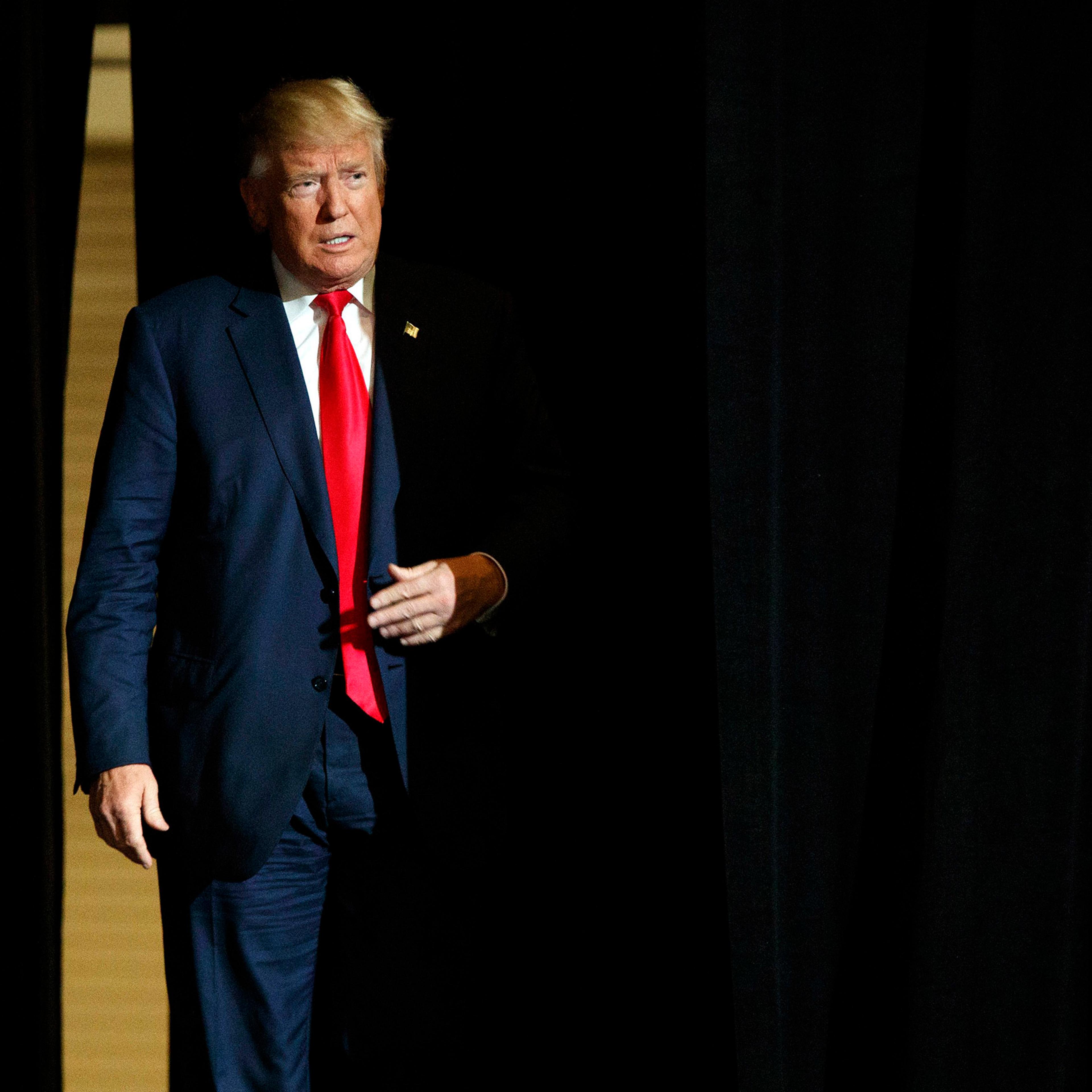 Donald Trump arrives to speak at a campaign rally at the South Florida Fairgrounds and Convention Center, Thursday, Oct. 13, 2016, in West Palm Beach, Fla.