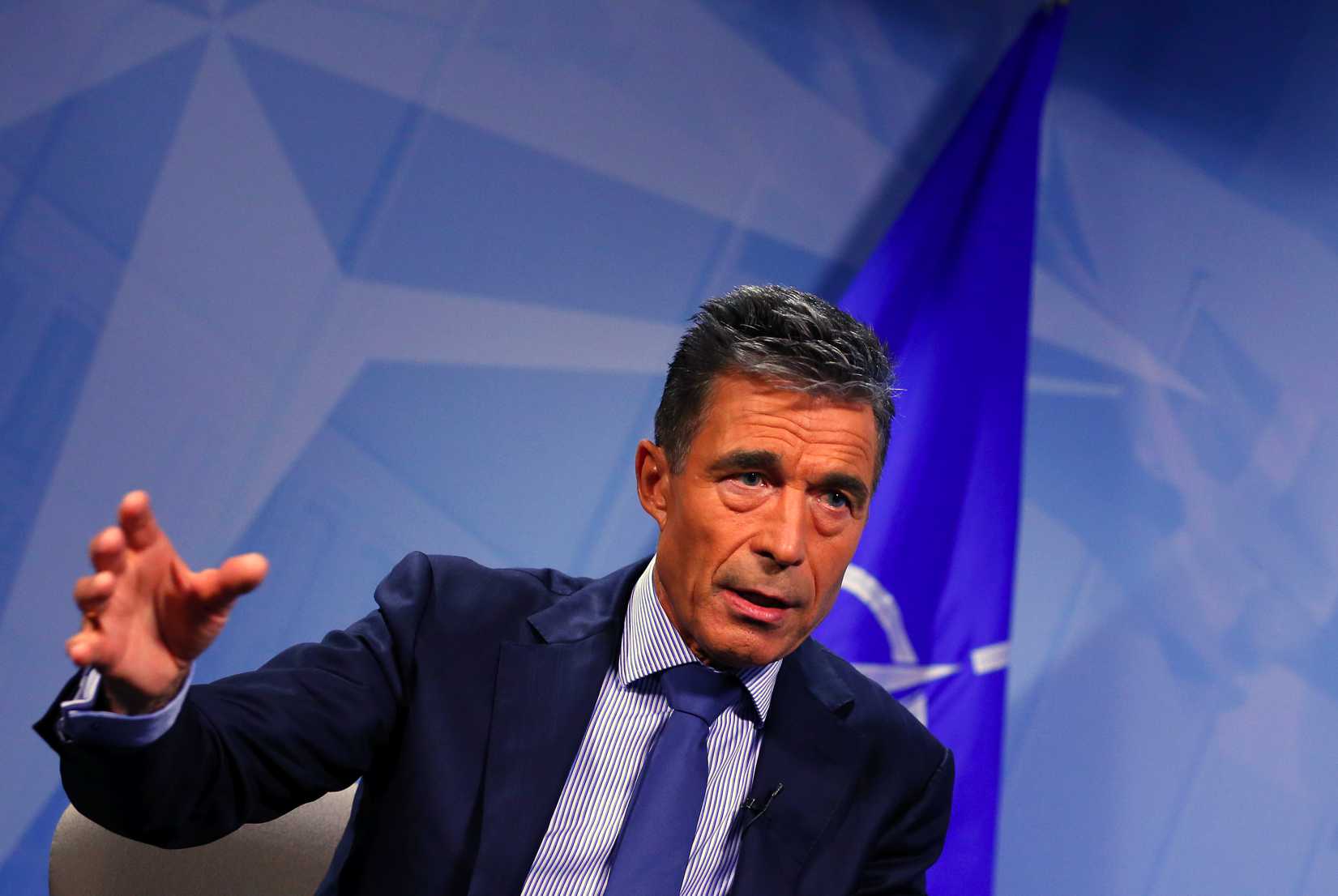 NATO Secretary General Anders Fogh Rasmussen speaks during an interview with Reuters in Brussels on August 11, 2014