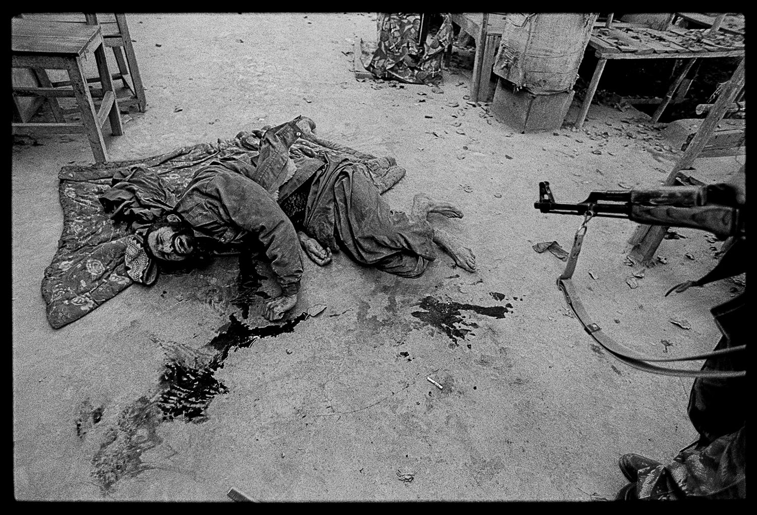 <b>James Nachtwey, November 22, 2001</b><br><br>
"The carefully negotiated hand-over of the city of Kunduz might be as good a reference as any to comprehend the reality of peace agreements in Afghanistan. Located in the north, near Uzbekistan, Kunduz was the last major stronghold of the Taliban following its withdrawal from Kabul. It had been under siege by the Northern Alliance, and an agreement was forged in which Taliban fighters would surrender in exchange for safe passage, and the city would be occupied by the alliance.<br><br>

For a couple of days, the Taliban began to drive out to their enemy’s lines and relinquish their weapons. On the appointed day, a large convoy of Northern Alliance troops moved forward. As it entered the city center, the remaining Taliban fighters opened fire from every direction. Chaos ensued. Both incoming and outgoing fire, from assault rifles, machine guns and rocket propelled grenade launchers was so dense and haphazard, one was as dangerous as the o