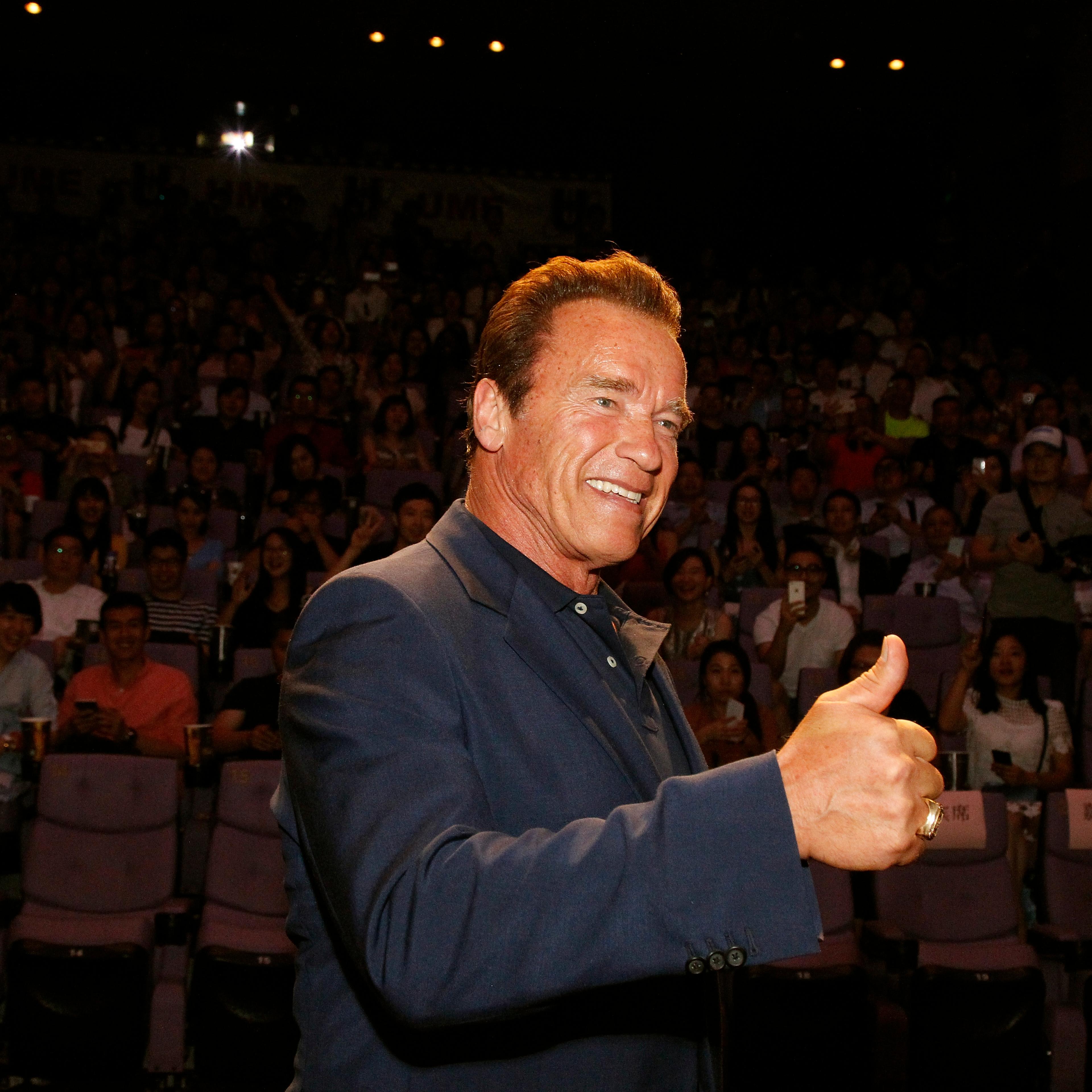 Arnold Schwarzenegger signals at a screening of the Terminator: Genisys on August 18, 2015 in Shanghai, China.