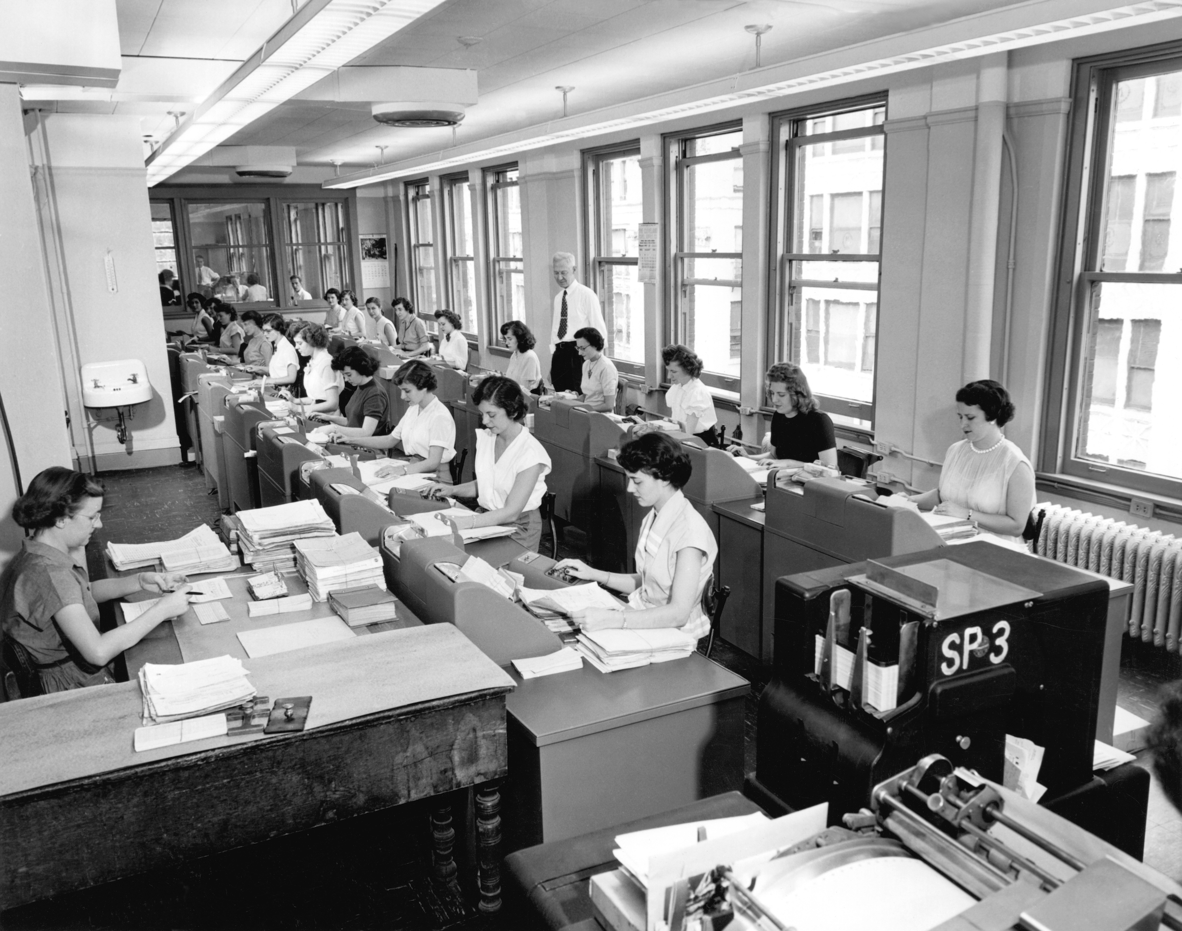 Office Workers Entering Data