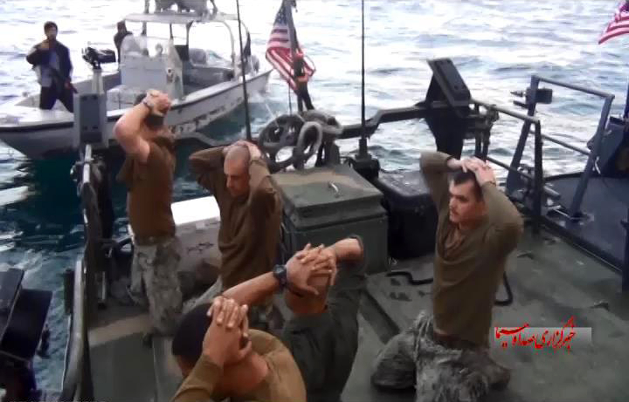 This frame grab from Tuesday, January 12, 2016 video by the Iranian state-run IRIB News Agency, shows detention of American Navy sailors by the Iranian Revolutionary Guards in the Persian Gulf, Iran. The 10 U.S. Navy sailors detained by Iran after their 