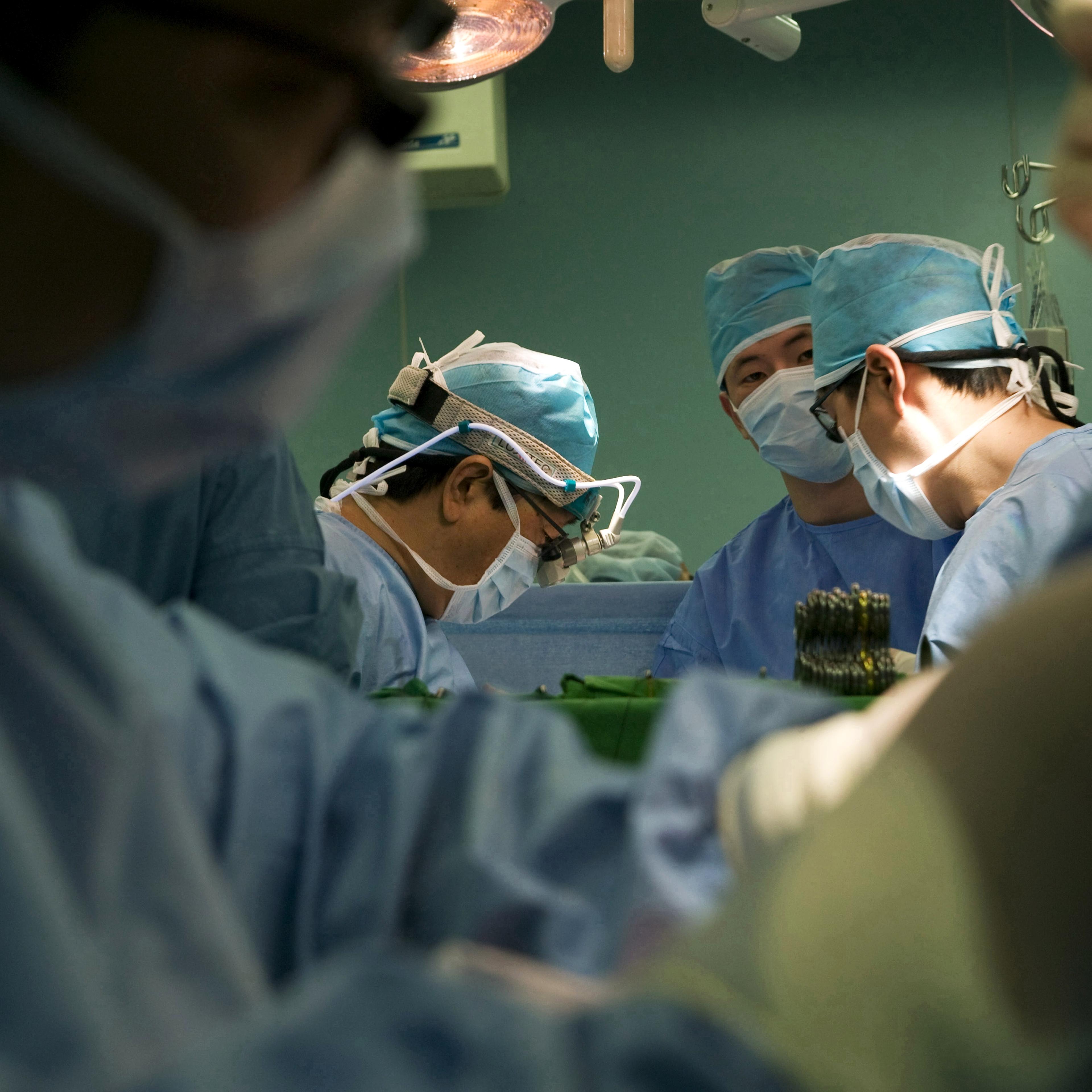 Surgeons operating