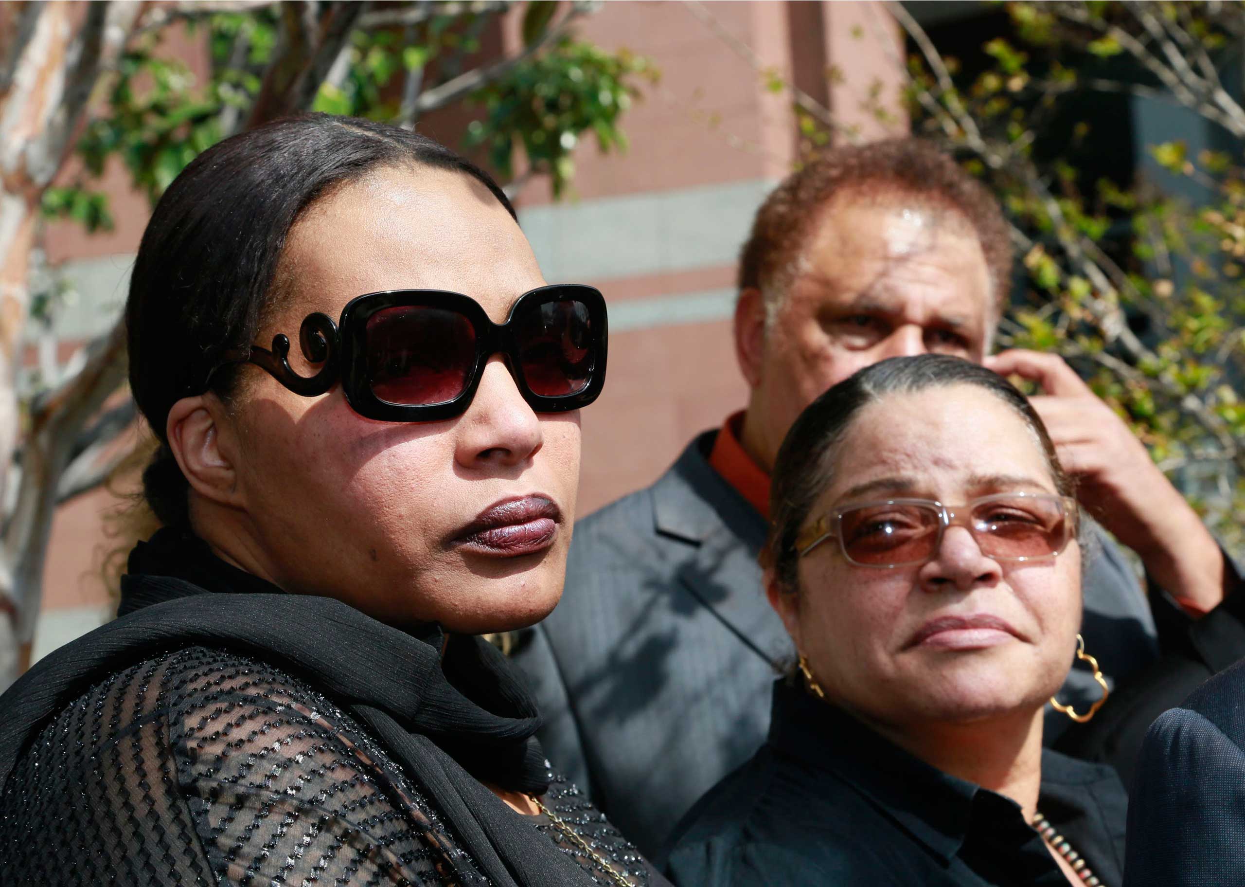 Marvin Gaye's daughter, Nona Gaye, left, and his ex-wife, Jan Gaye, take questions from the media outside Los Angeles U.S. District Court, after a jury awarded the singer's children nearly $7.4 million after determining singers Robin Thicke and Pharrell 