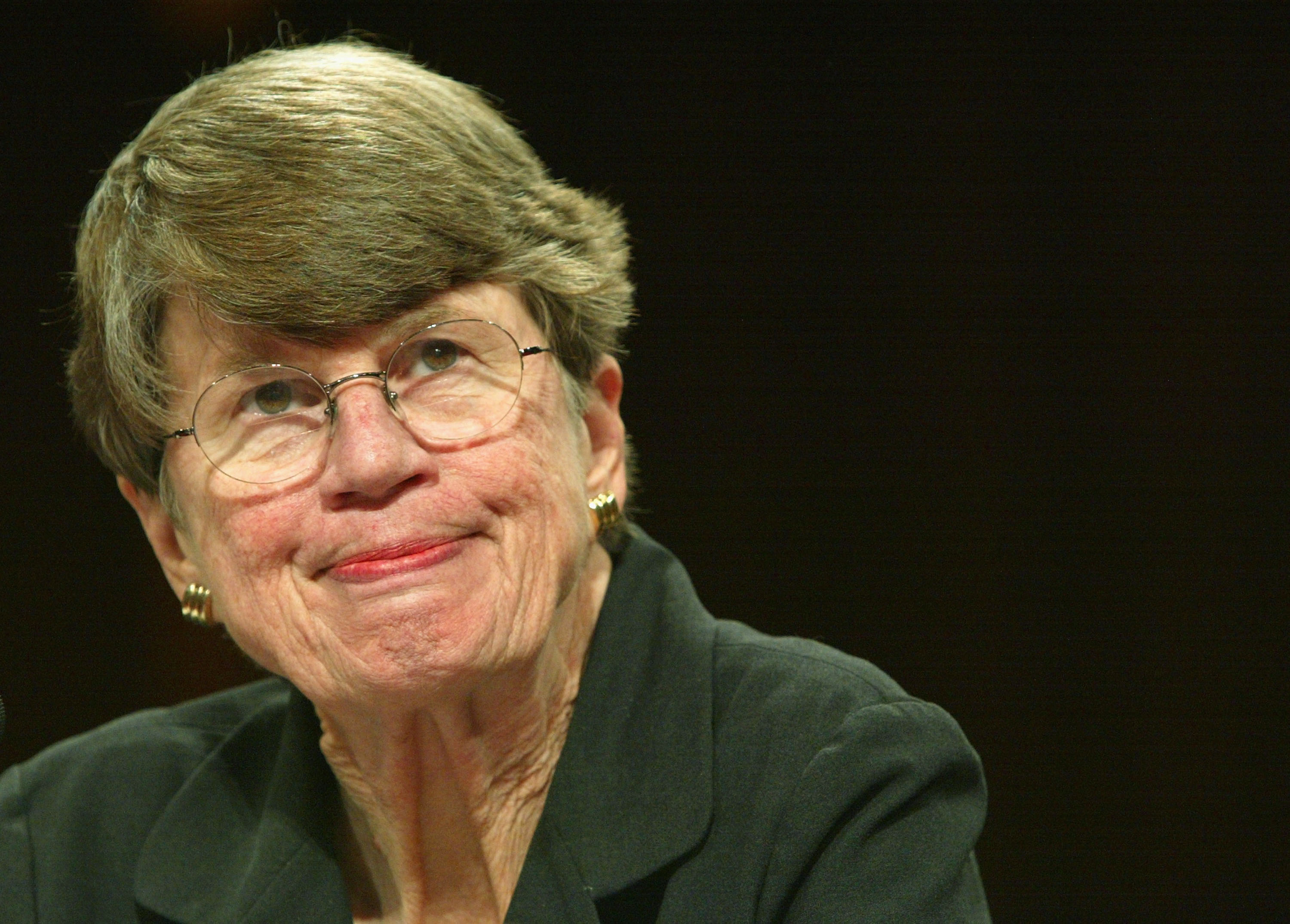 Former U.S. Attorney General Janet Reno pauses as she testifies during the 10th public hearing on the performance of law enforcement and the intelligence community prior to September 11 attacks before the National Commission on Terrorist Attacks Upon the