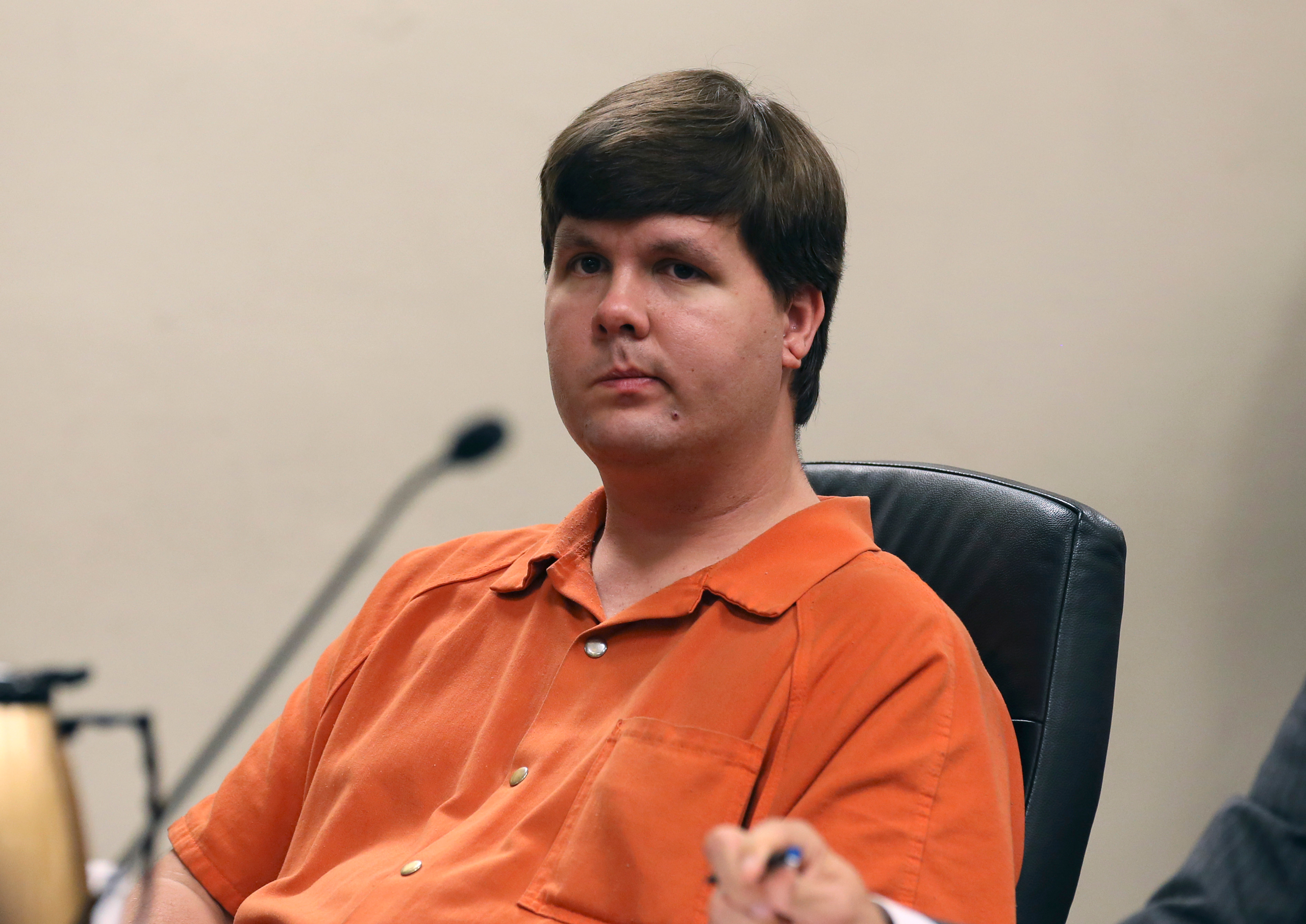 Justin Ross Harris sits in Cobb County Magistrate Court in Marietta, Georgia July 3, 2014. A judge denied bail on Thursday for Harris who prosecutors said intentionally left his 22-month-old son strapped inside a hot car to die because he wanted to live 