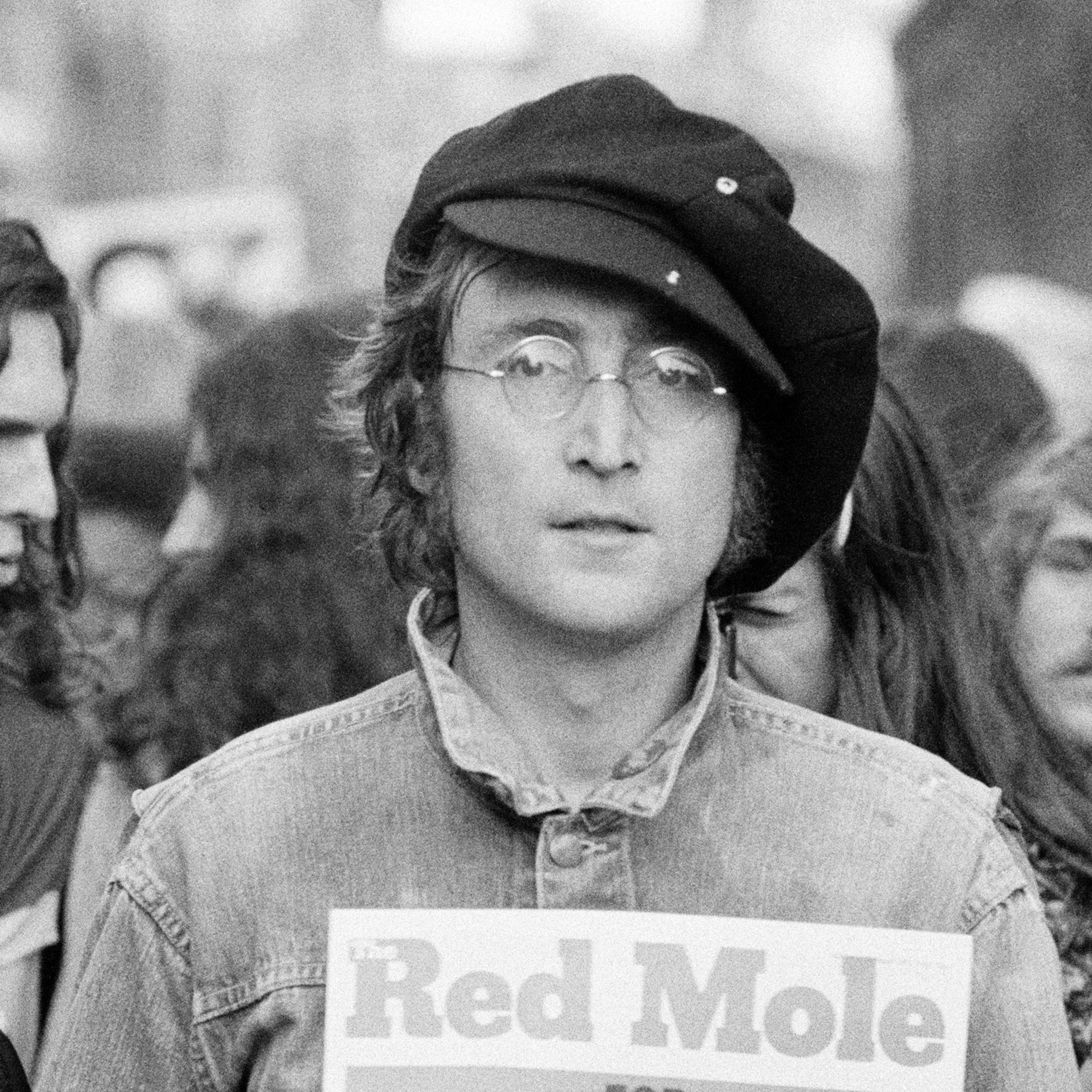 John Lennon and Yoko Ono (extreme left) as they attend a rally in Hyde Park, London, England, 1975.