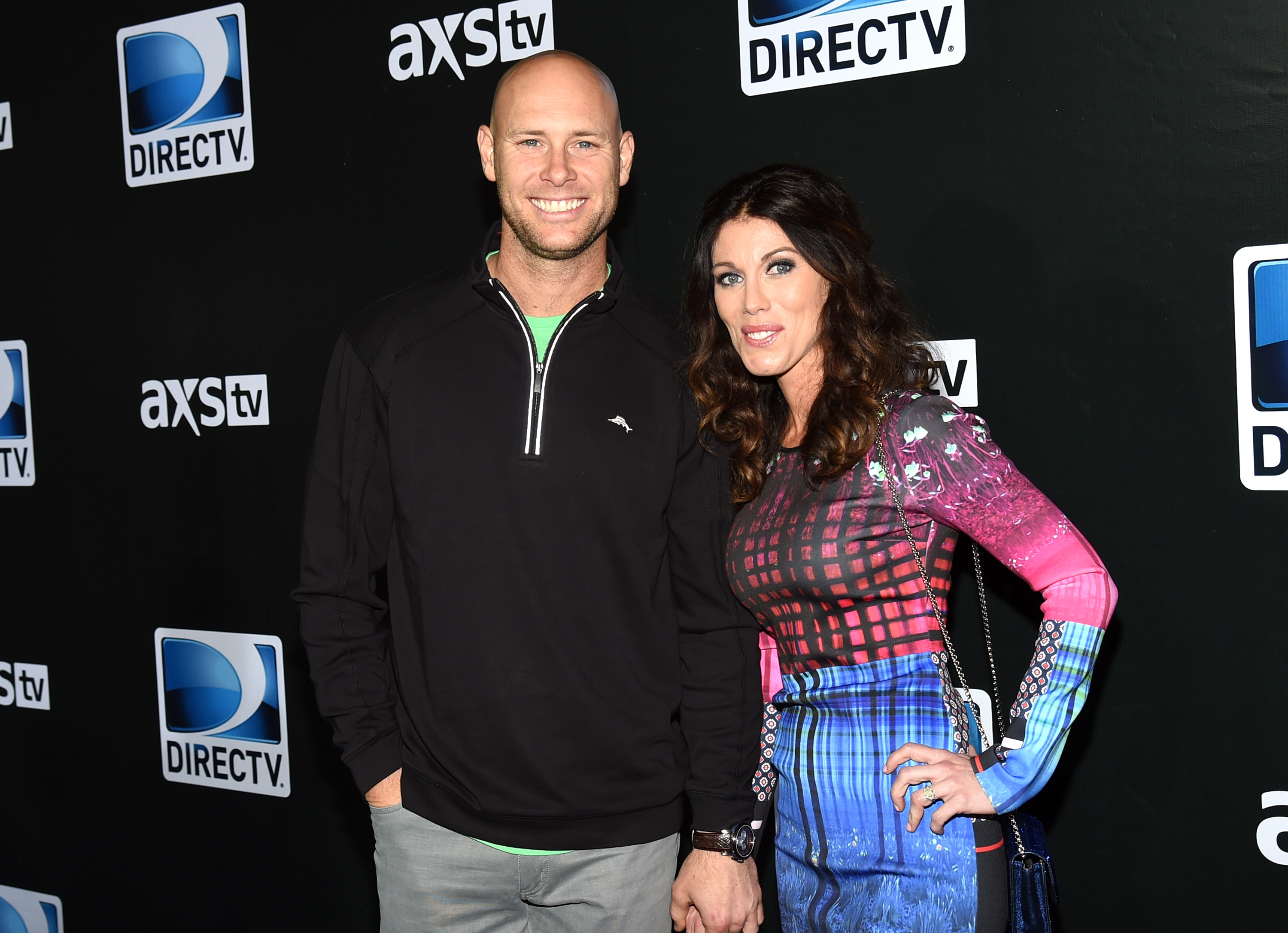 New York Giants kicker Josh Brown (L) and Molly Brown attend DirecTV Super Saturday Night hosted by Mark Cuban's AXS TV and Pro Football Hall of Famer Michael Strahan at Pendergast Family Farm on January 31, 2015 in Glendale, Arizona.