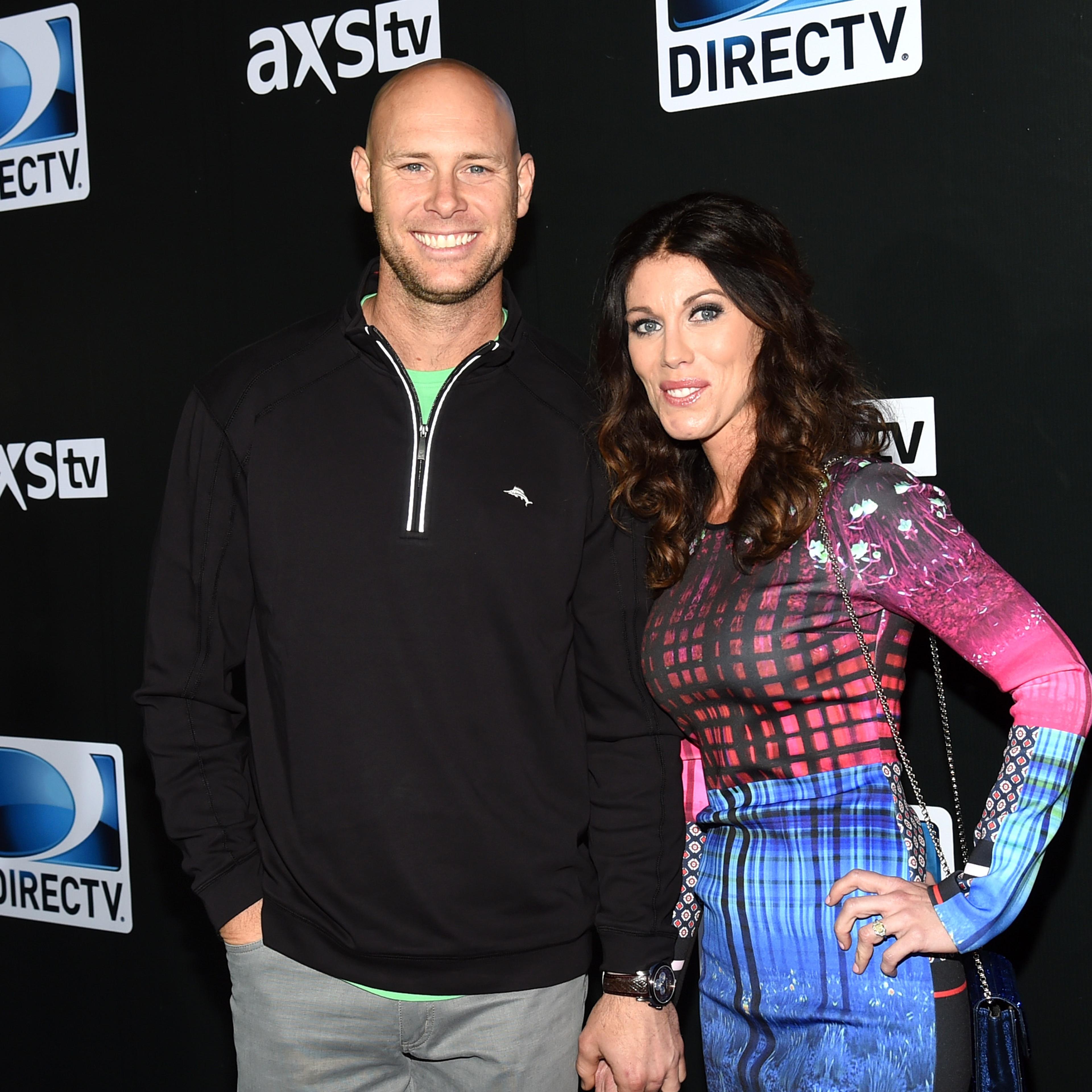New York Giants kicker Josh Brown (L) and Molly Brown attend DirecTV Super Saturday Night hosted by Mark Cuban's AXS TV and Pro Football Hall of Famer Michael Strahan at Pendergast Family Farm on January 31, 2015 in Glendale, Arizona.
