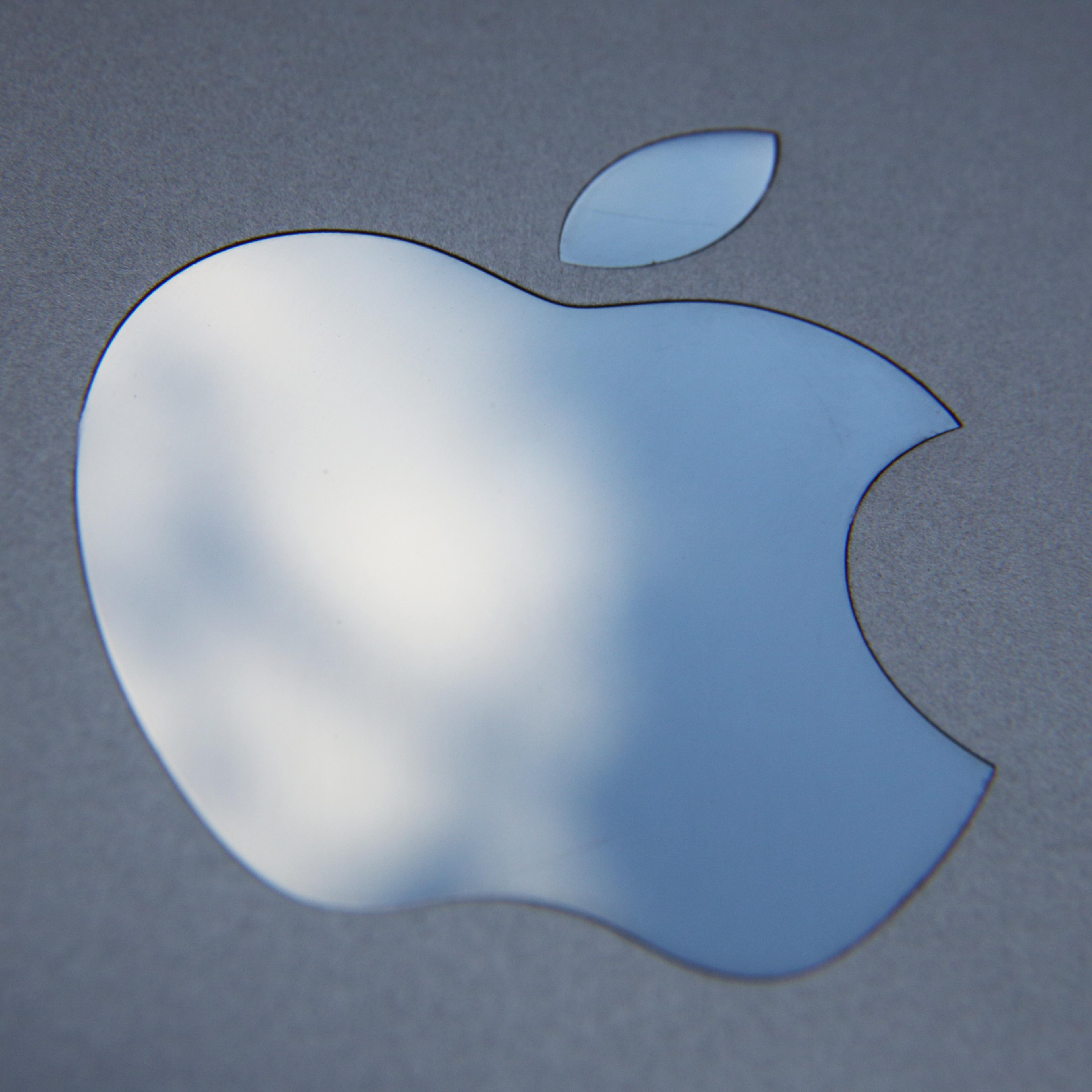 In this photo illustration the logo on an Apple iPad is seen on August 6, 2014 in London, England.