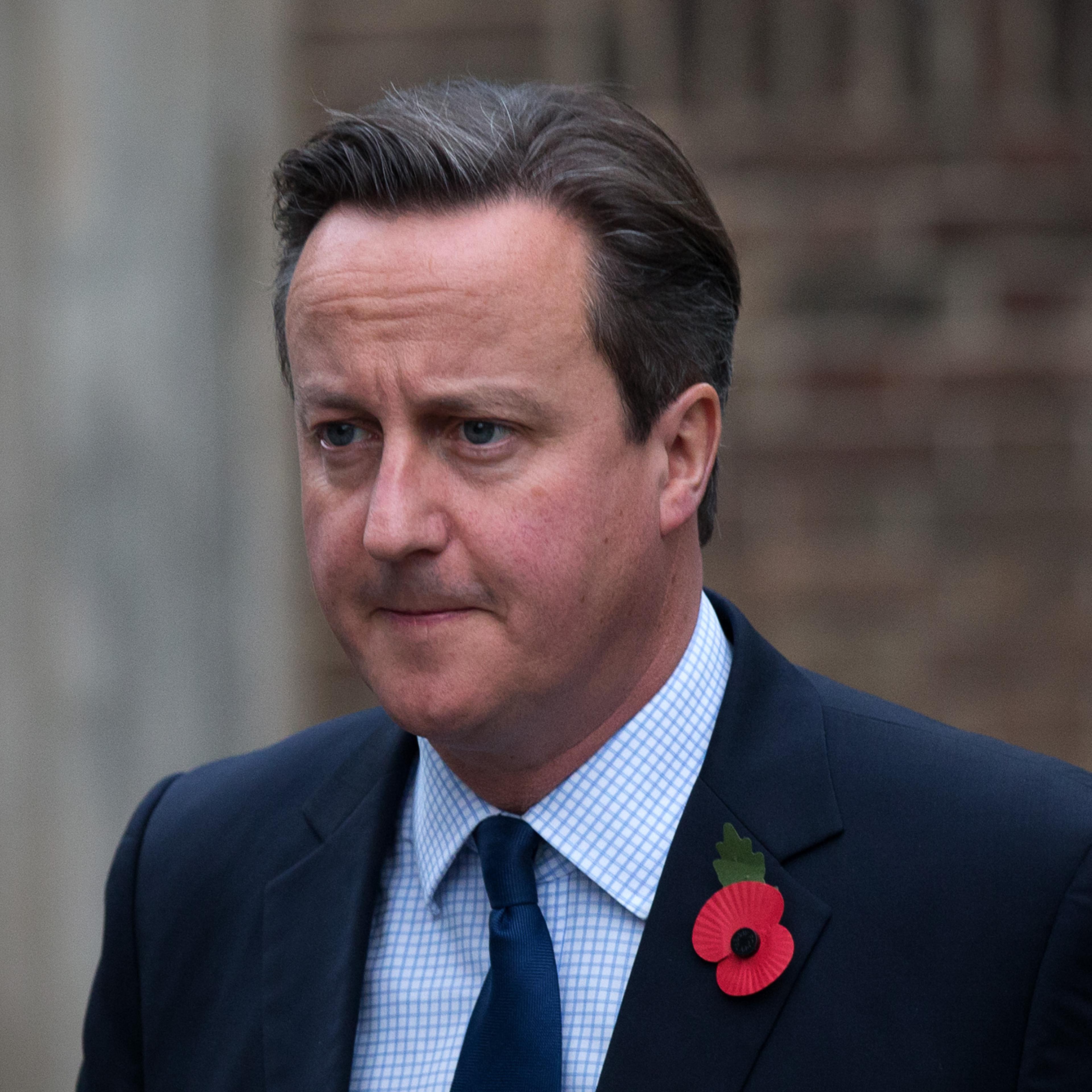 Prime Minister David Cameron arrives to a memorial service