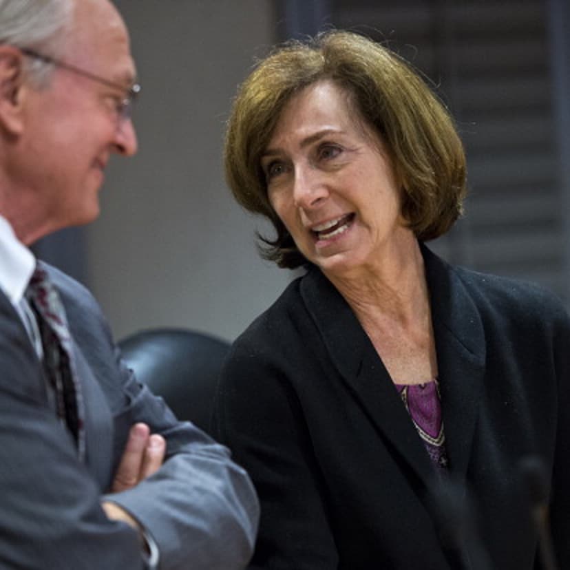 FEC Commissioner Ann Ravel confers with Commissioner Steven Walther before her first meeting at the Commission's downtown office.
