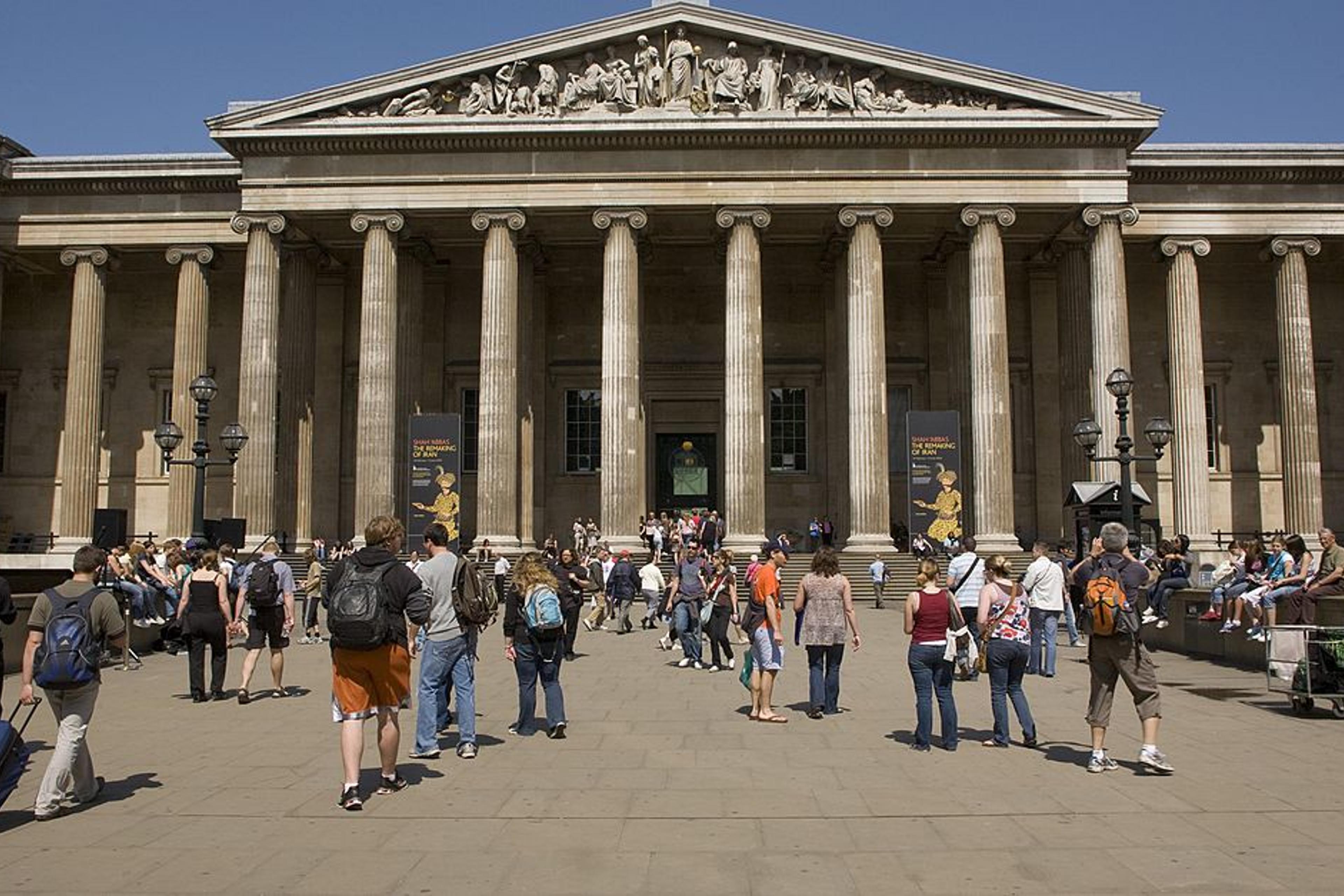 LONDON, ENGLAND, UNITED KINGDOM - 2009: Visitors to the British Museum are seen outside the entrance in this 2009 London, United Kingdom, cityscape photo.
