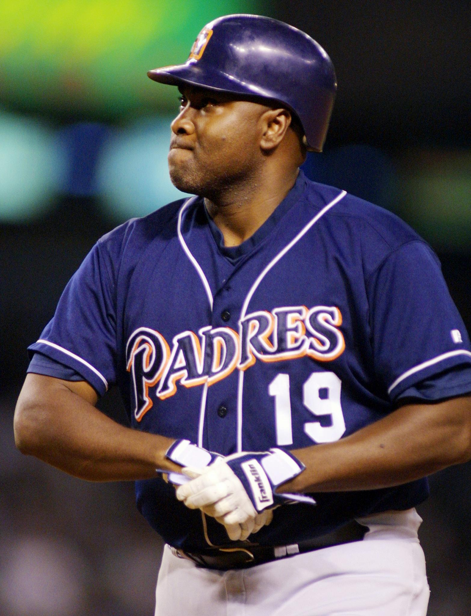 San Diego Padres' Tony Gwynn removes his batting g
