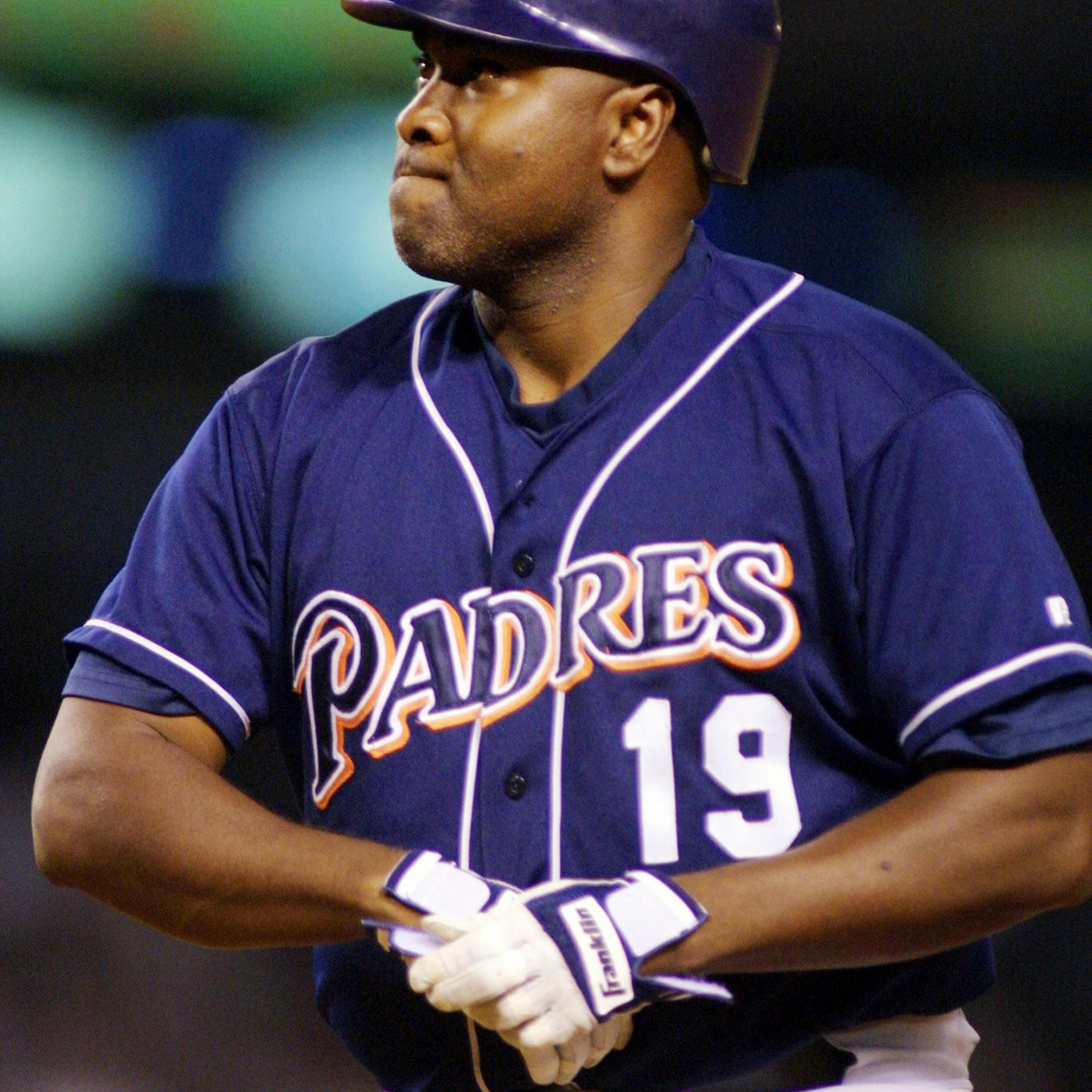 San Diego Padres' Tony Gwynn removes his batting g