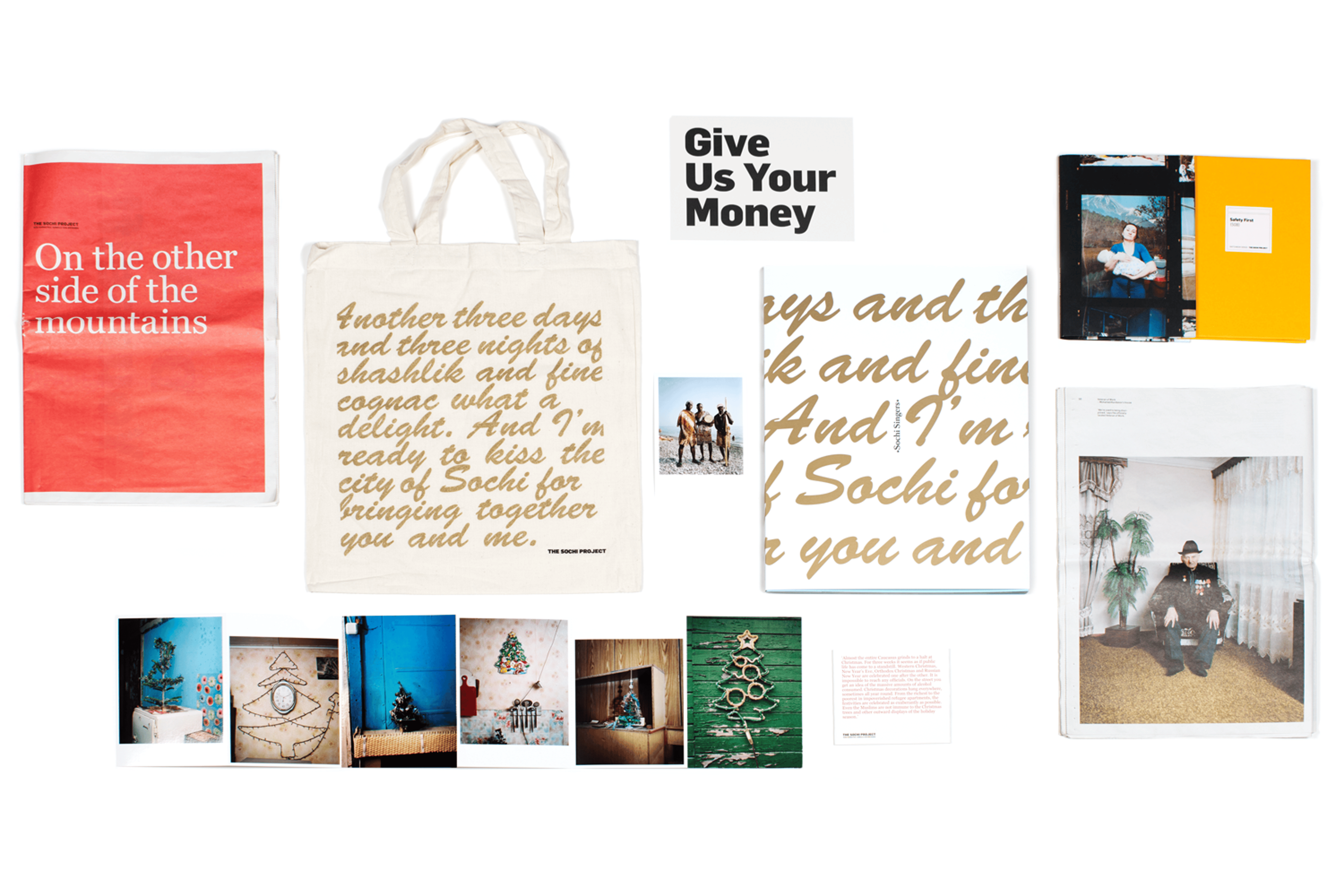 Selected materials from The Sochi Project, including Sochi Singers with accompanying bag and postcard, Safety First, On the other side of the mountains newspaper and the Christmas cards collection.