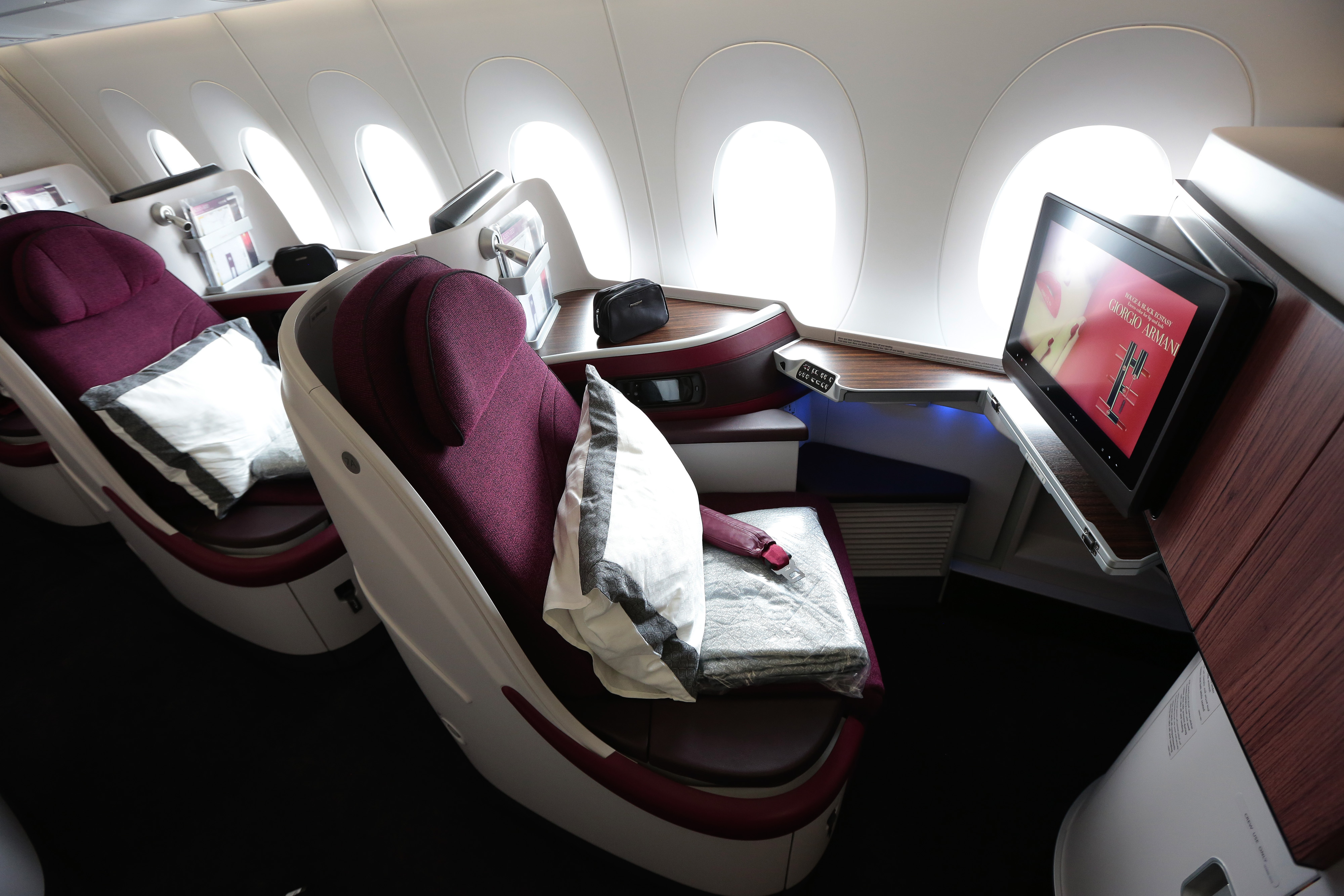 First class cabin booths sit aboard an Airbus SAS A380 aircraft, operated by Qatar Airways Ltd., on the opening day of the 51st International Paris Air Show in Paris, France, on Monday, June 15, 2015.