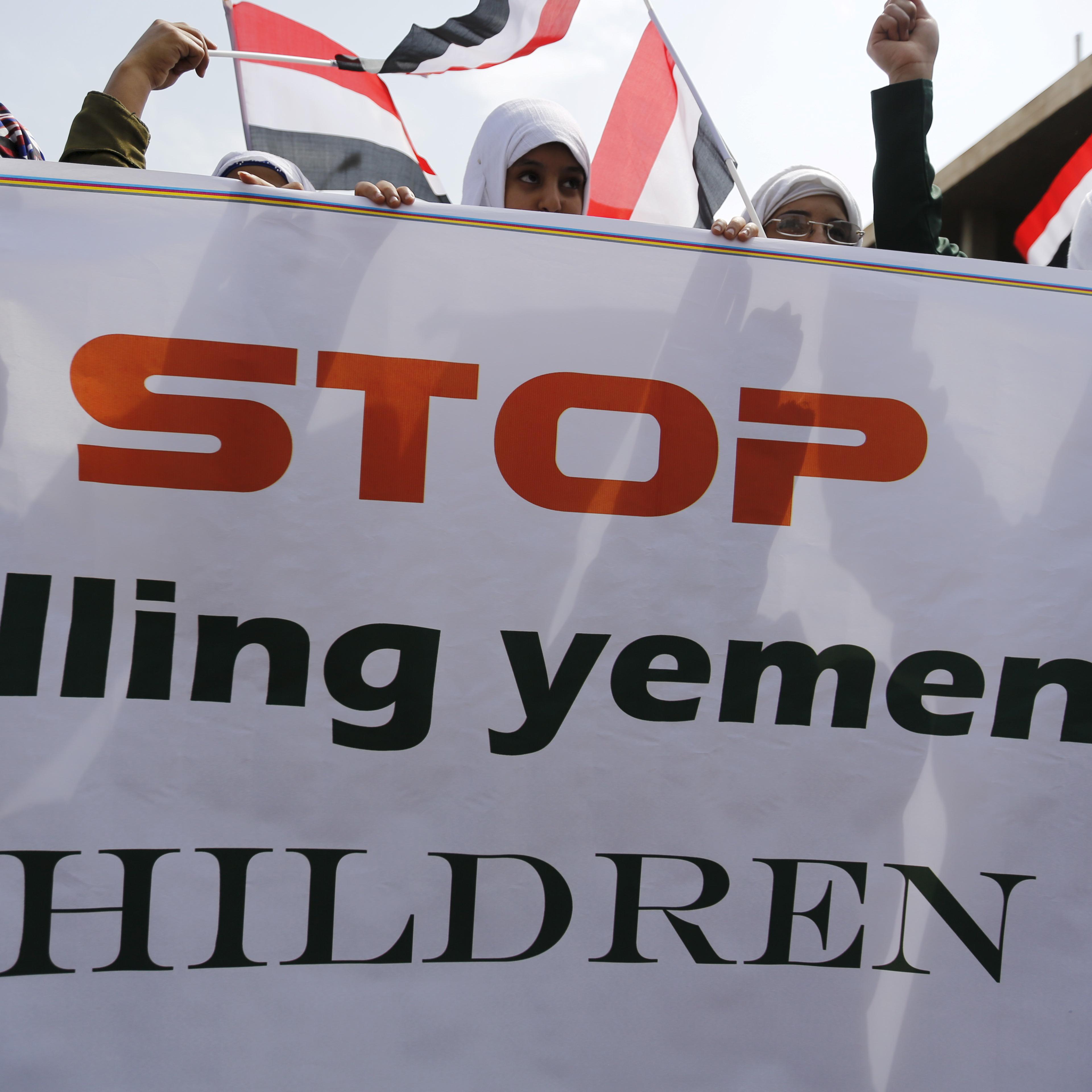 Girls demonstrate against the Saudi-led coalition outside the offices of the United Nations in Yemen's capital Sanaa