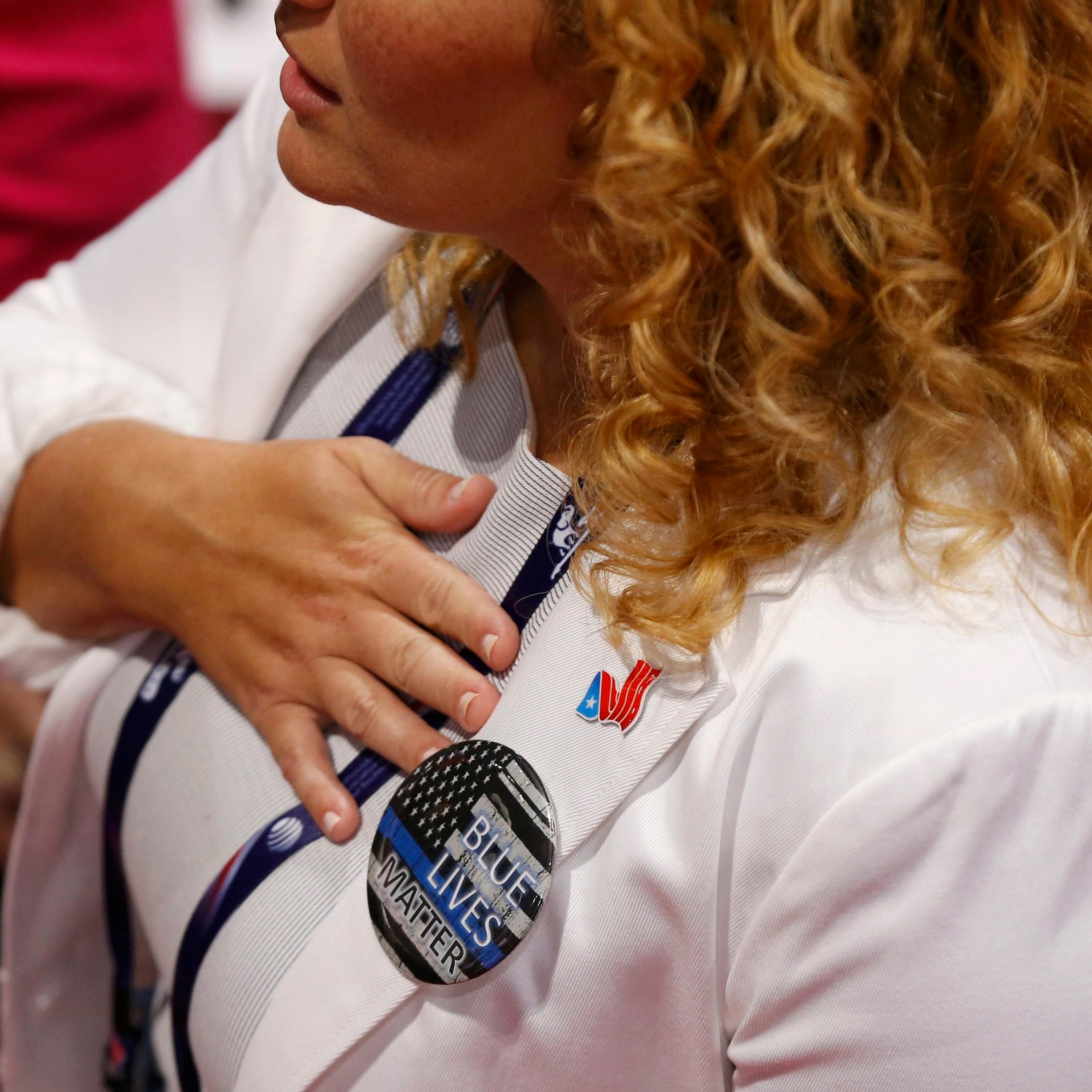 A delegate wears a "Blue Lives Matter" button at the Republican National Convention in Cleveland, July 18, 2016.