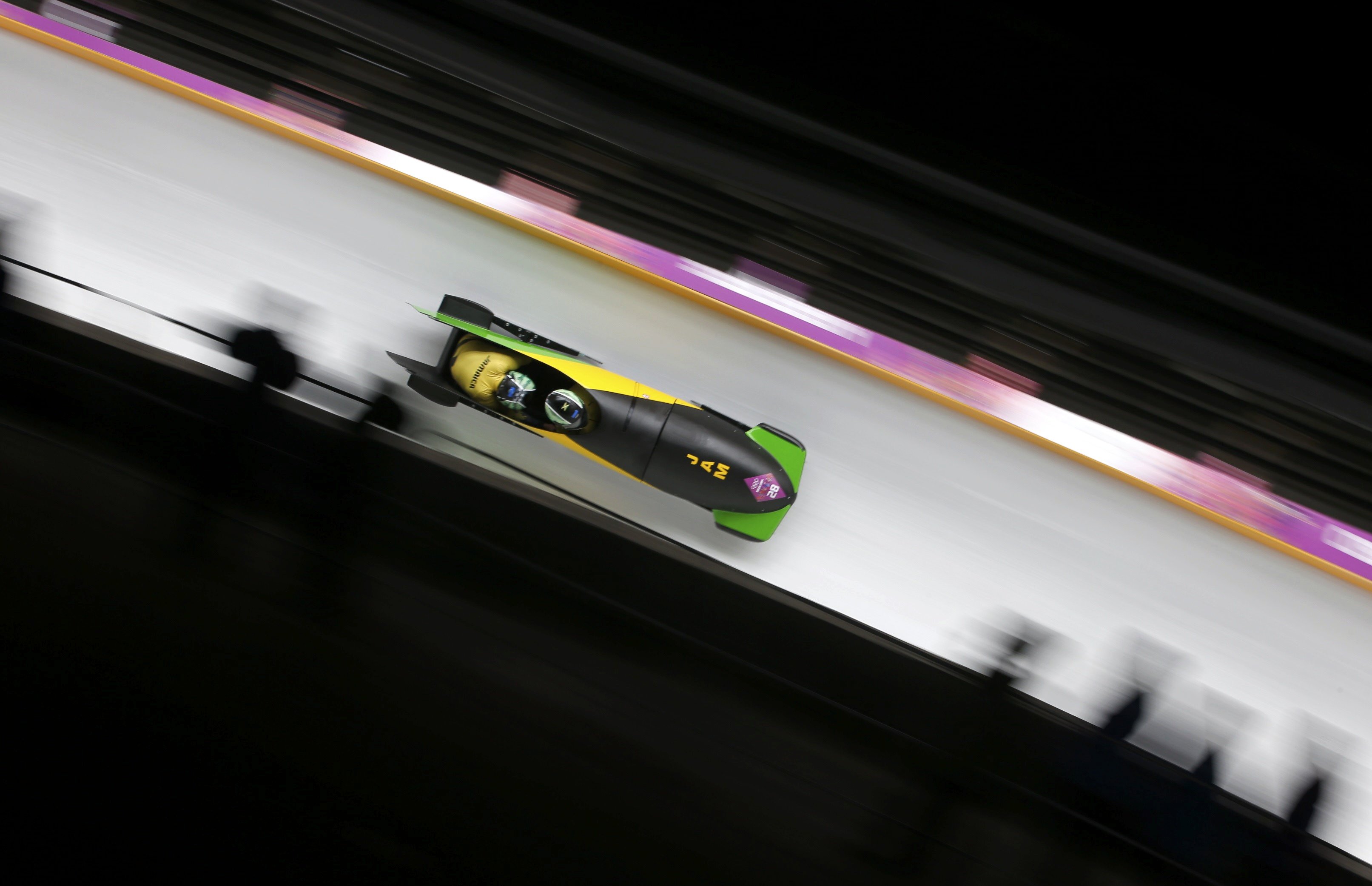 Jamaica's Winston Watts and Marvin Dixon speed down the track during the two-man bobsleigh event at the 2014 Sochi Winter Olympics