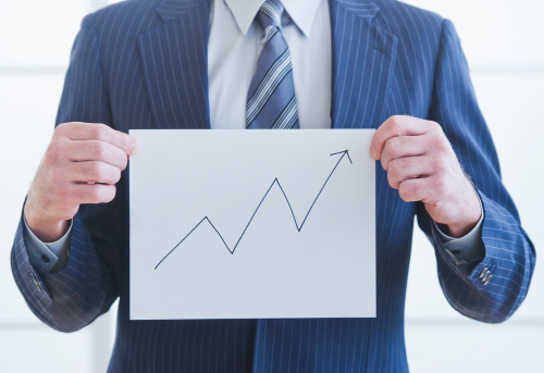 businessman-holding-chart