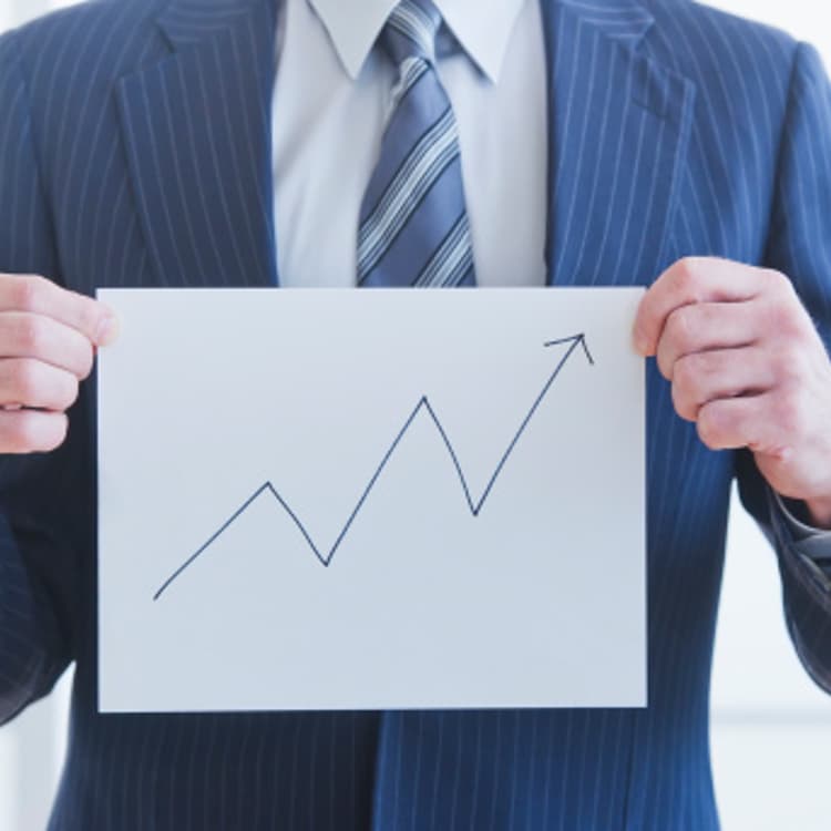 businessman-holding-chart