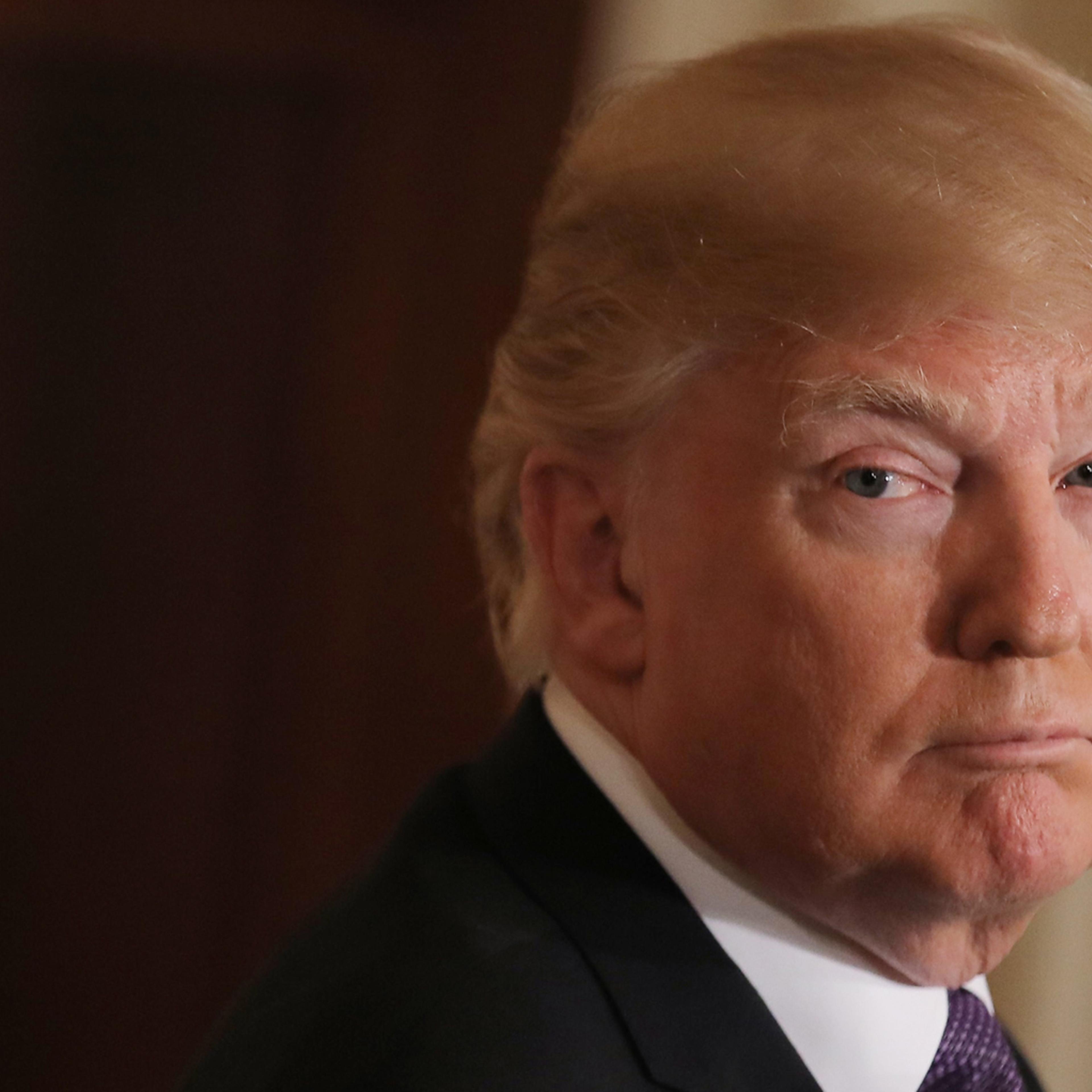 U.S. President Donald Trump listens during joint news conference with Trudeau at the White House in Washington