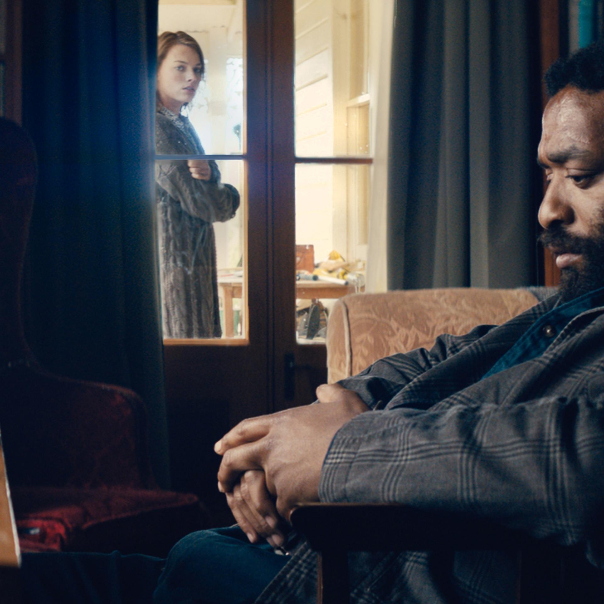 Margot Robbie and Chiwetel Ejiofor in <em>Z for Zachariah</em>