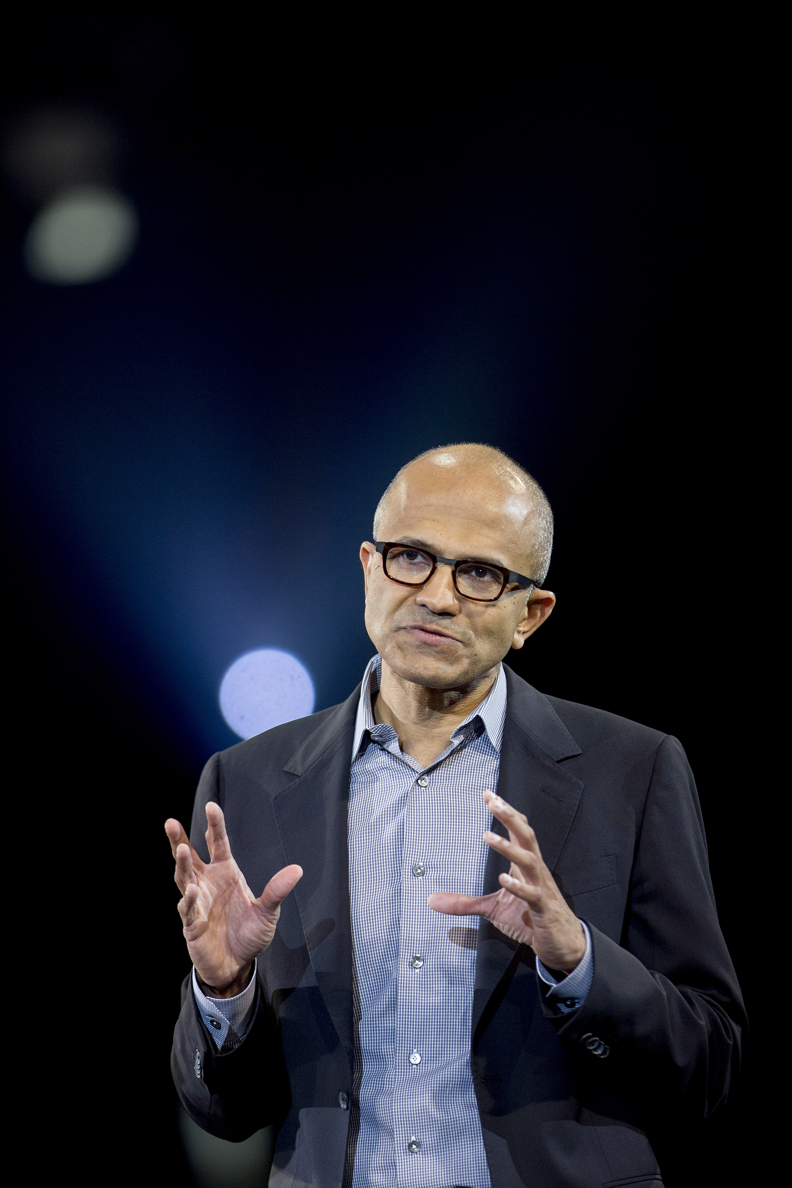 Satya Nadella, chief executive officer of Microsoft Corp., speaks during a keynote session at the Microsoft Worldwide Partner Conference in Washington on July 16, 2014.
